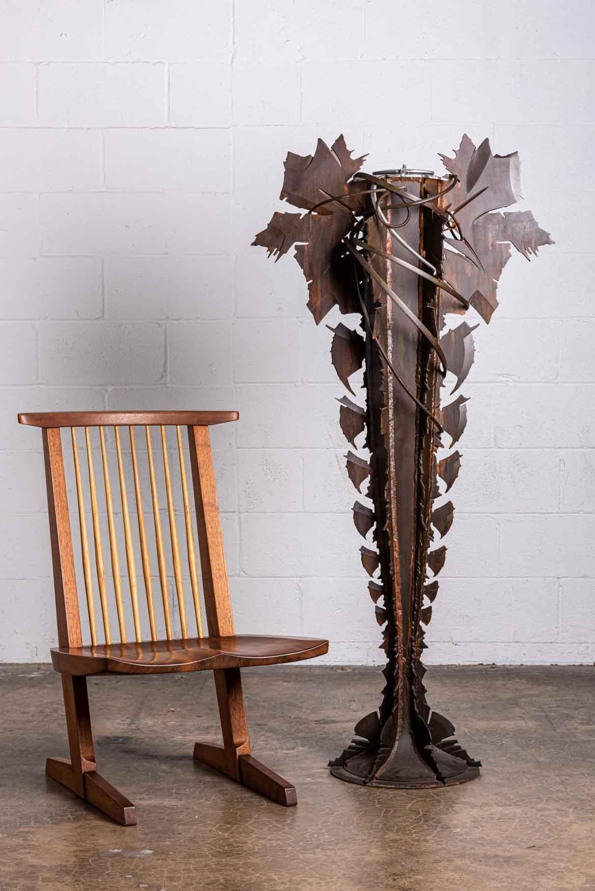 A large scale, forged steel floor vase with removable insert. Signed and dated Albert Paley, 1993-1994.