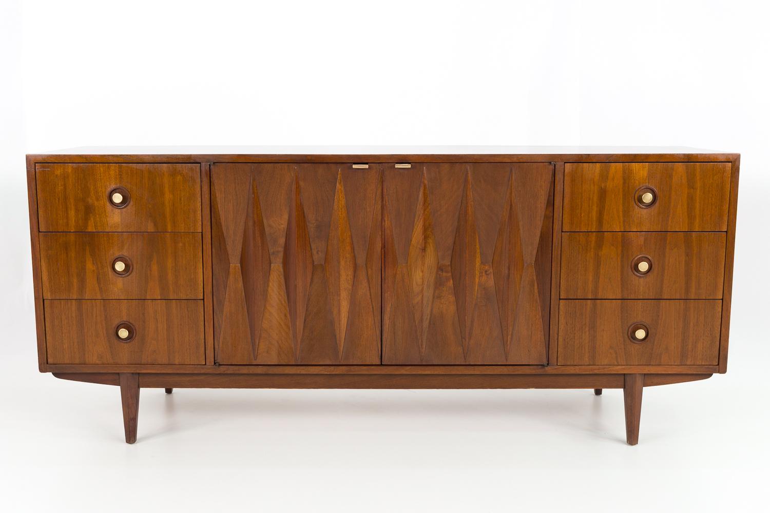 Albert Parvin for American of Martinsville mid century diamond walnut and brass 9 drawer lowboy dresser

This piece measures: 70 wide x 18.5 deep x 30.25 inches high

All pieces of furniture can be had in what we call restored vintage condition.