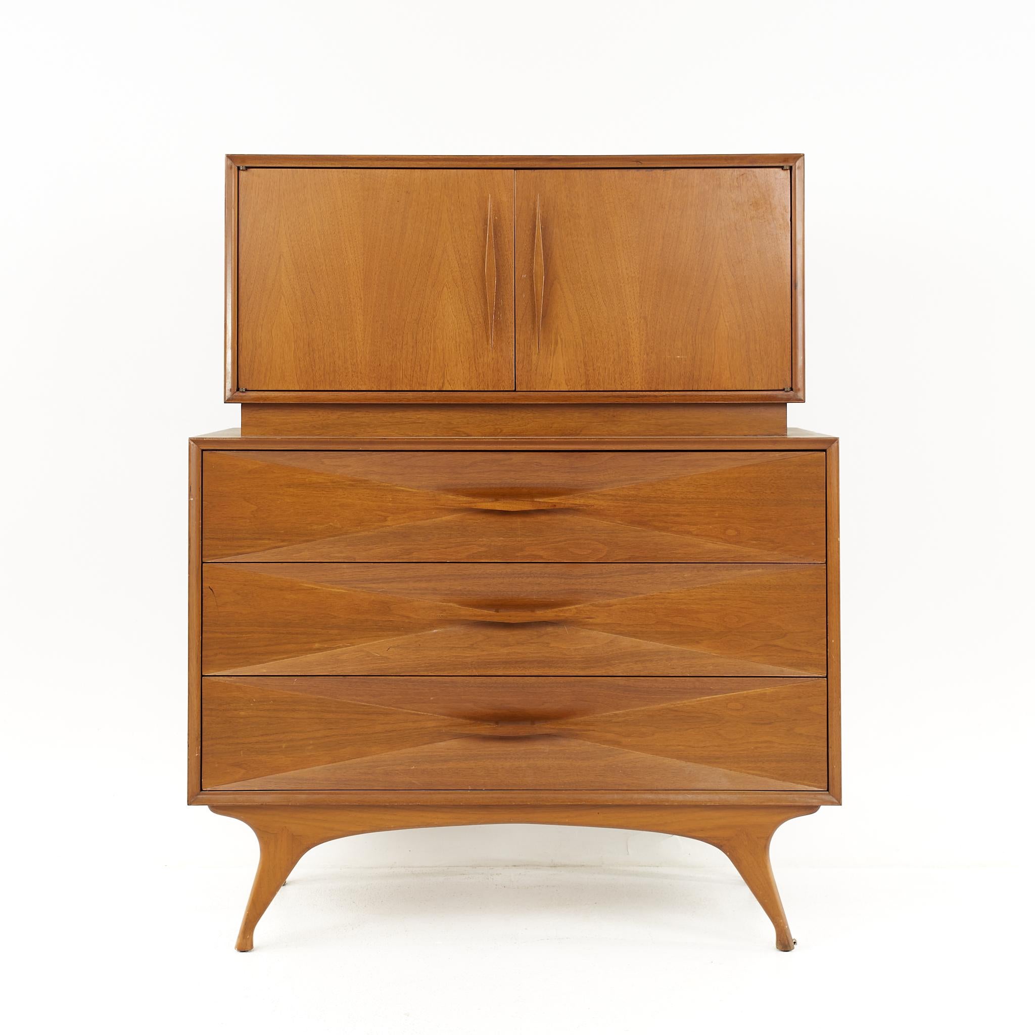 Albert Parvin Style Roma Mid Century Sculpted Walnut Highboy Dresser

The dresser measures: 40 wide x 19 deep x 49 inches high

All pieces of furniture can be had in what we call restored vintage condition. That means the piece is restored upon