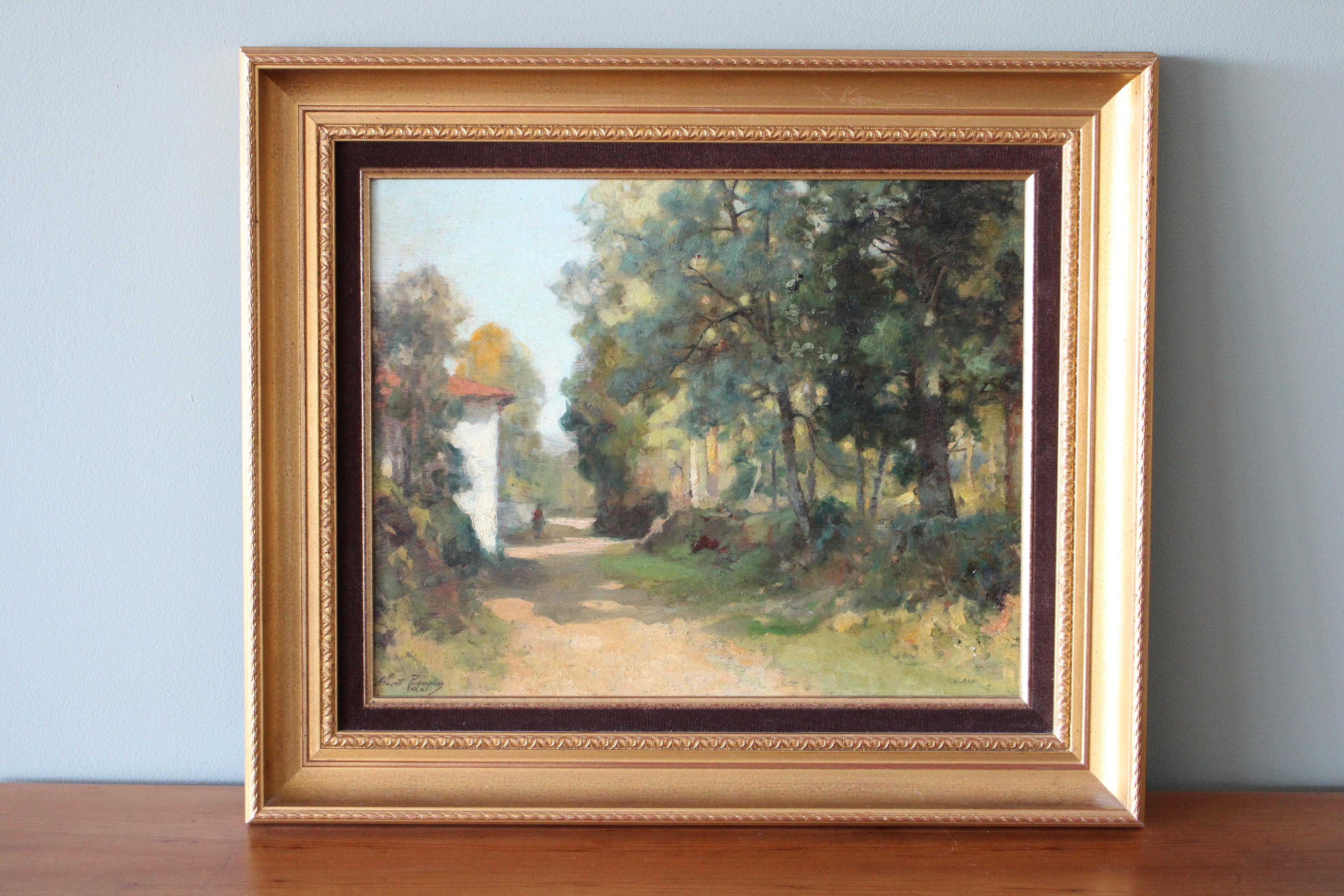 Vintage country road landscape oil painting on wood by French artist, Albert Regagnon, it's from the 1930's and signed in the lower left corner.  A woman walks down a country pathway past a house whose stone facade gleams in the sunshine.  The