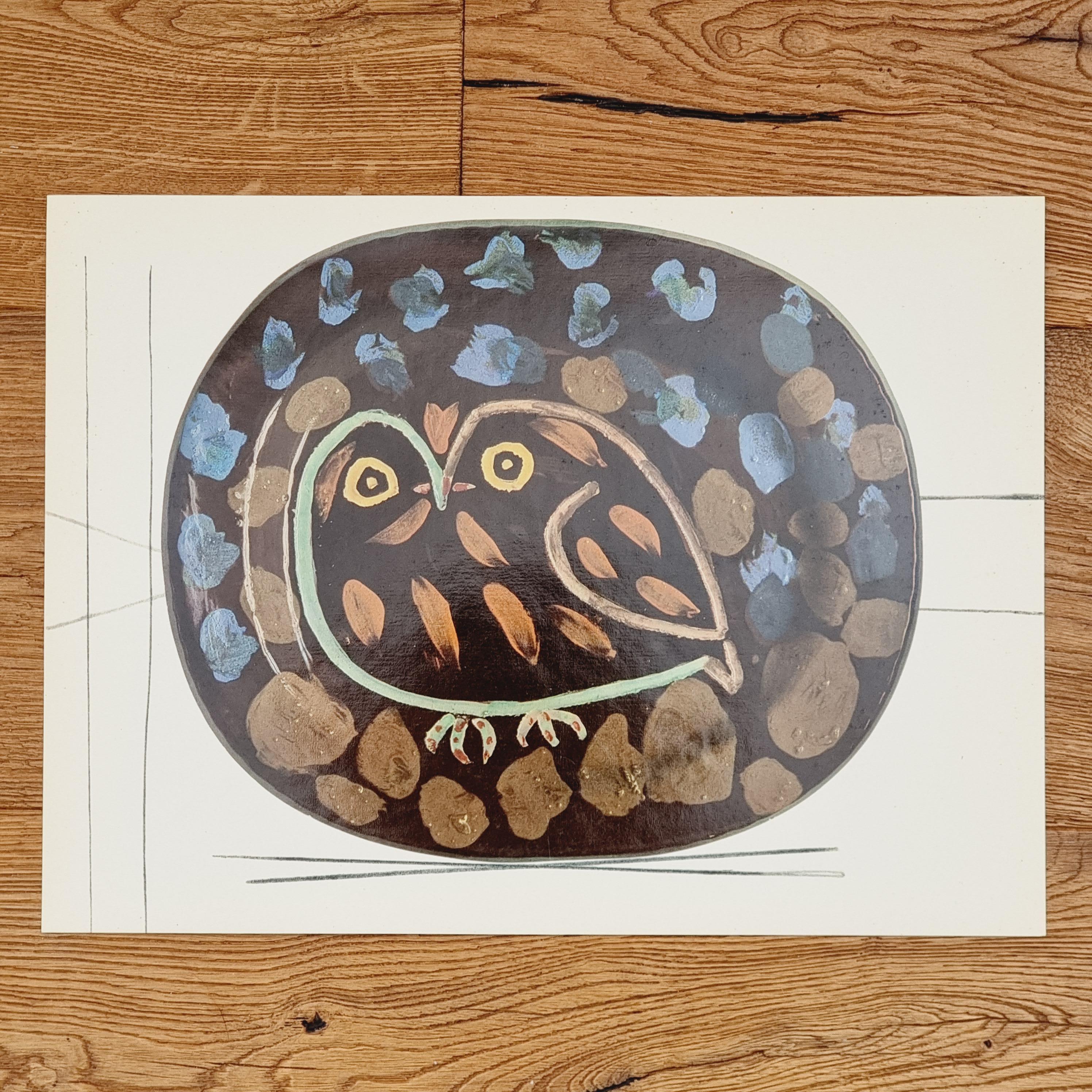 An exquisite shiny polychrome print of Picasso Vallauris ceramic plate depicting two birds. The color print is attached to a thick, high quality paper with decorative lines. 

The print is originally from a Limited Edition Art Folio 