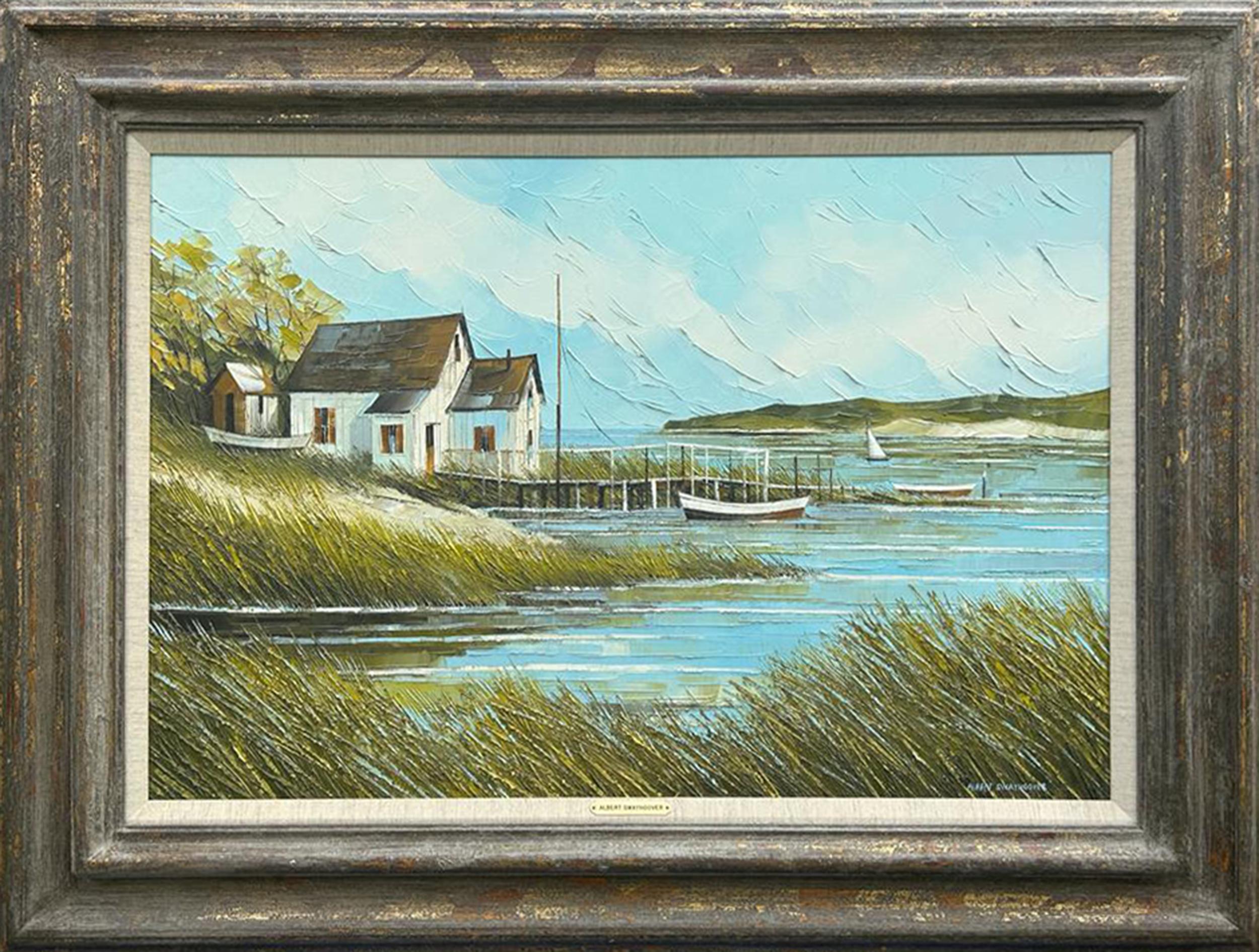 A breezy coastal scene of an ocean inlet flanked by tall green grasses. Up in the dunes is a white house serviced by a pier and a few sailboats can be seen bobbing in the water.

Coastal House
Albert Swayhoover, American (1931–2017)
Oil on Canvas,