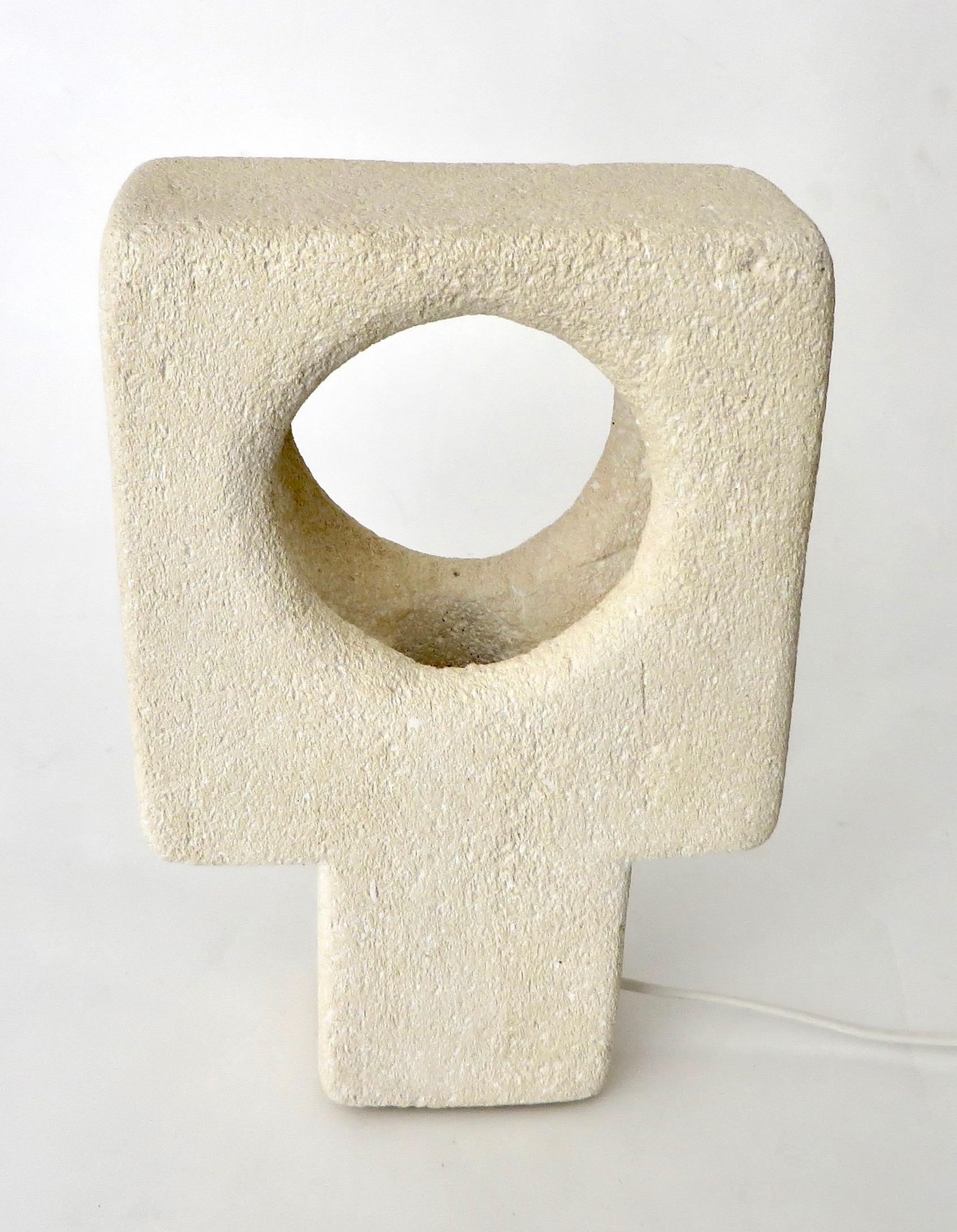 Hand-carved French volcanic luberon limestone or tuff stone lamp with a minimalist beton-brut architectural bearing. By Vallauris artist Albert Tormos, made circa 1970s. Incised signature 