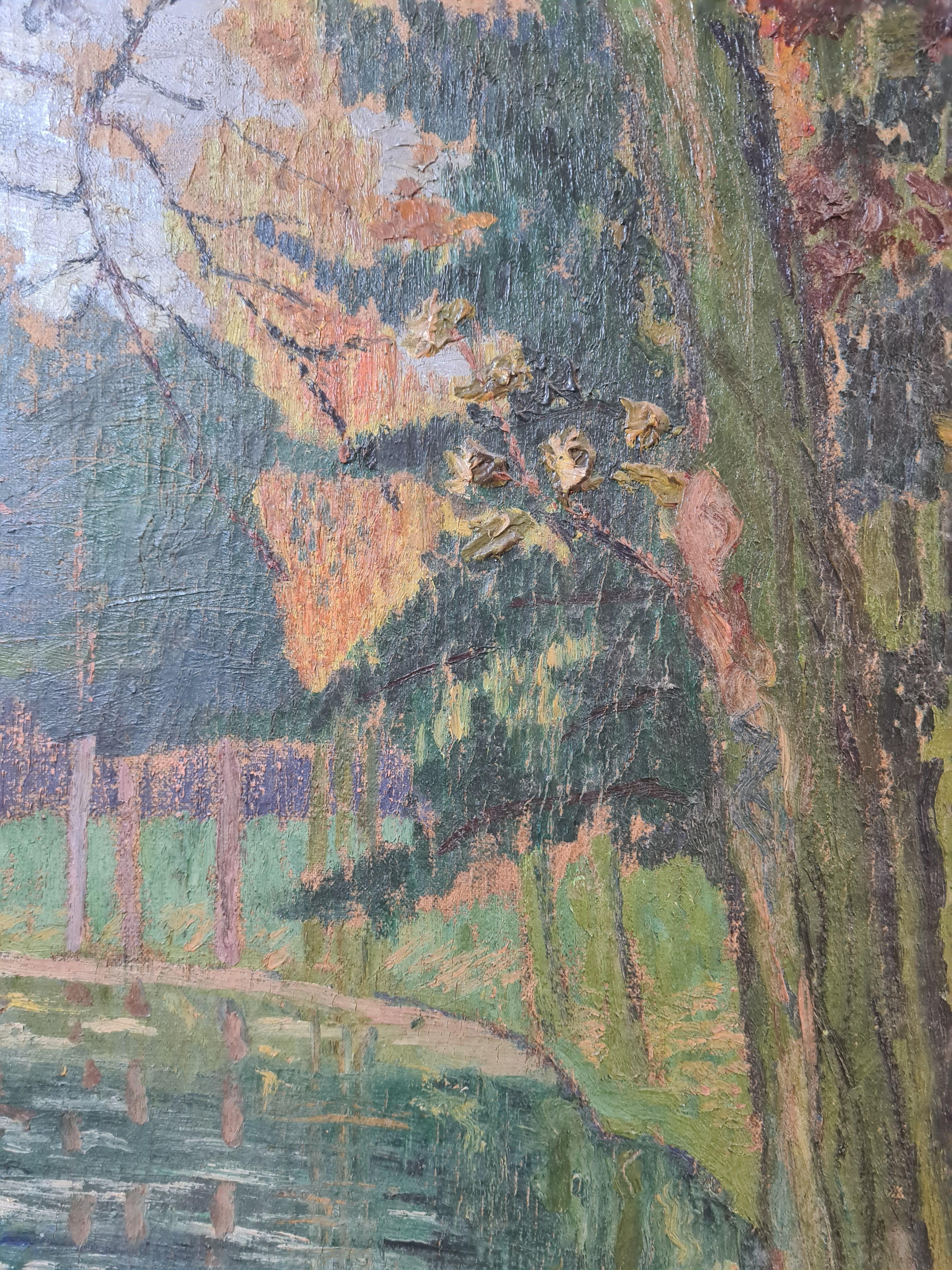 Huile sur toile impressionniste française représentant une rivière dans un parc, réalisée par le célèbre artiste français Albert Uriet. Le tableau est signé et daté en bas à droite et est présenté dans un beau cadre sculpté et doré. Il s'agit d'une