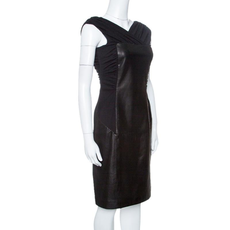 This dress from Alberta Ferretti is as delighting as it is gorgeous and stylish at the same time. Made from quality materials, including leather, the dress flaunts ruched detailing on the sides. Designed to perfection, this black dress will look