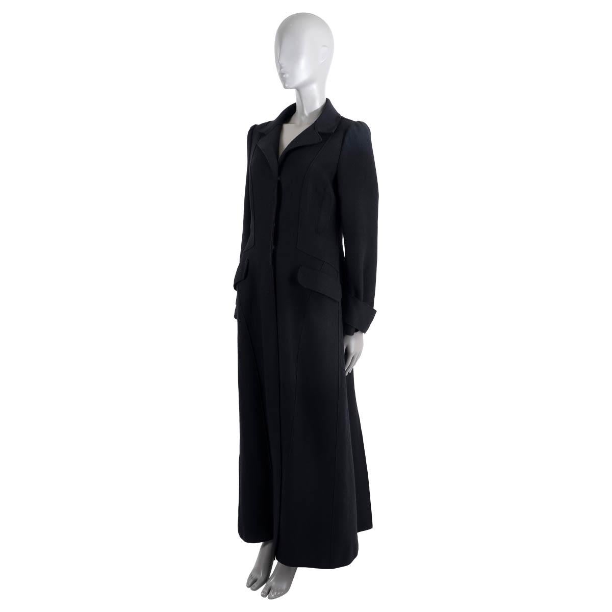 100% authentic Alberta Ferretti single-breasted maxi coat in black wool (80%) and polyamide (20%). Features notched lapels, two flap chest pockets, two flap pockets at the waist and belts around the cuffs. Closes with snap buttons on the front.