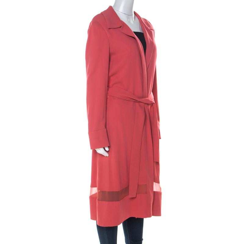 You'll surely love owning this coral pink coat from Alberta Ferretti because it has been wonderfully made to keep you warm. The long coat comes with long sleeves, sheer panels and a belt at the waist.

Includes: Original Tag