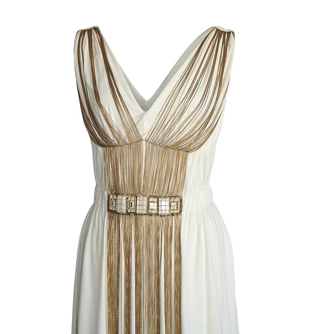 Guaranteed authentic Alberta Ferretti cream dress with delicate chains creating shape and accentuating the front. 
Stones at waist are set with fine 'rope' and edged in matte sequins.
V shaped front and rear with soft pleated detail. 
Unique empire