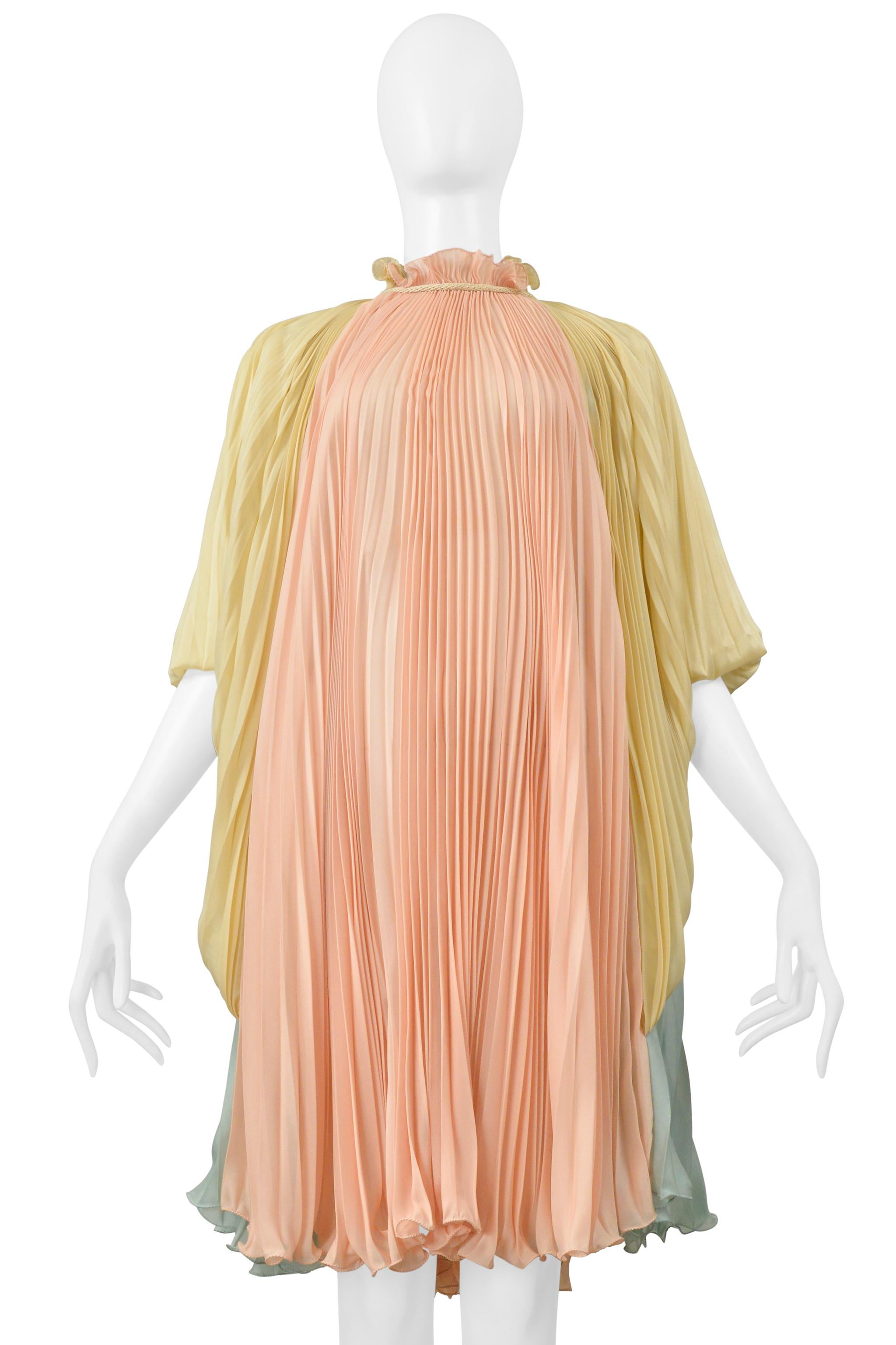 Resurrection Vintage is thrilled to present a stunning Alberta Ferretti multicolor pastel goddess dress featuring pleated fabric, a high collar with cord, delicate draping, billowing sleeves, an easy body, and above-the-knee length. 

Alberta