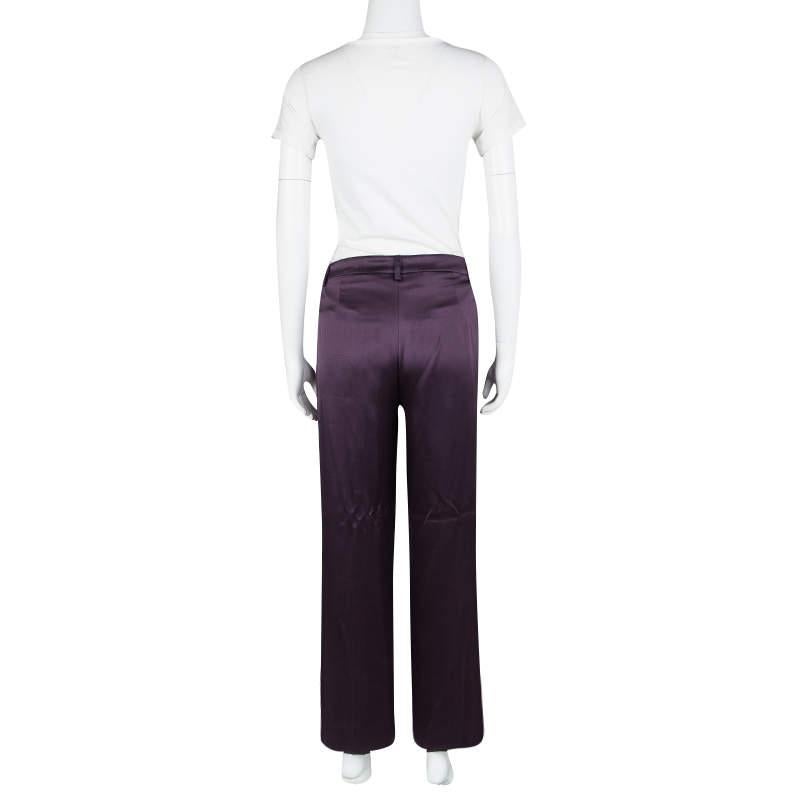 These pants from Alberta Ferretti are high in style and comfort. It is made of quality silk and it flaunts a purple hue with belt loops on the waistband and wide legs. It will look fabulous with a simple top and high heels.

