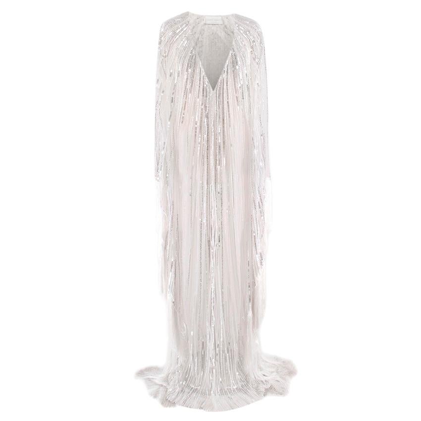 Alberta Ferretti Runway Limited Edition Couture Embellished Gown

- Sheer 
- Heavy weight
- 70s inspired Couture dress from Fall 2018 
- Detailed poncho style dress Embellished with sequins all over 
- Silvery white fringed trim

Aprox.
