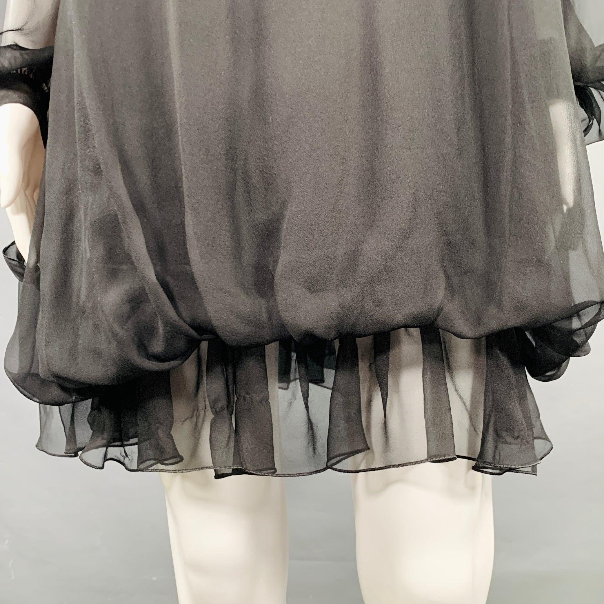 ALBERTA FERRETTI dress
in a black silk featuring a sheer ruffled design, long bishop sleeves with cuff ties, and slip with back zip up closure. Made in Italy.Very Good Pre-Owned Condition. Missing brand tag. Minor signs of wear. 

Marked:   IT 40
