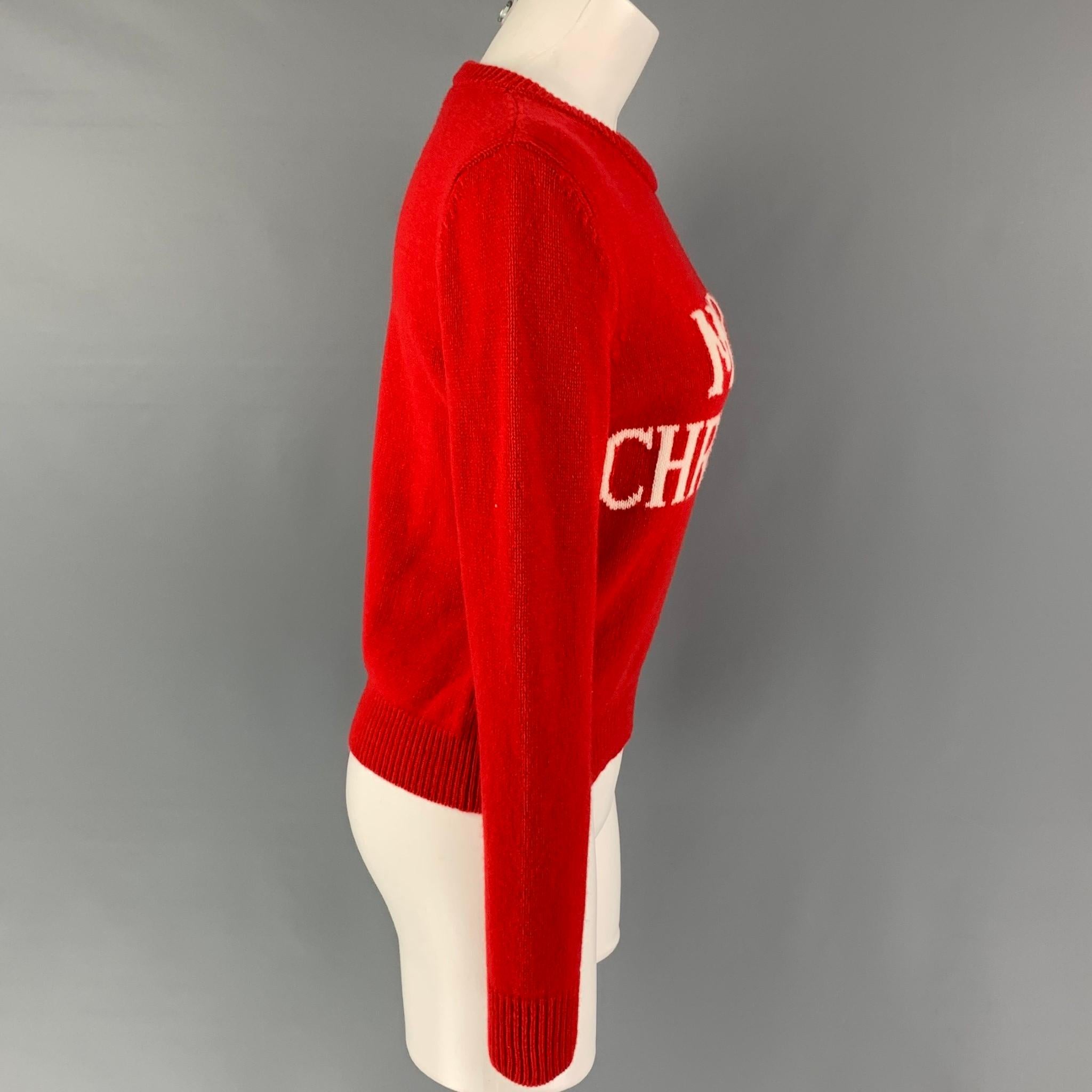 ALBERTA FERRETTI sweater comes in a red virgin wool featuring a white front 'Merry Christmas' design and a crew-neck. Made in Italy.

Very Good Pre-Owned Condition.
Marked: I 40 / F 36 / D 36 / GB 8 / 
Original Retail Price: