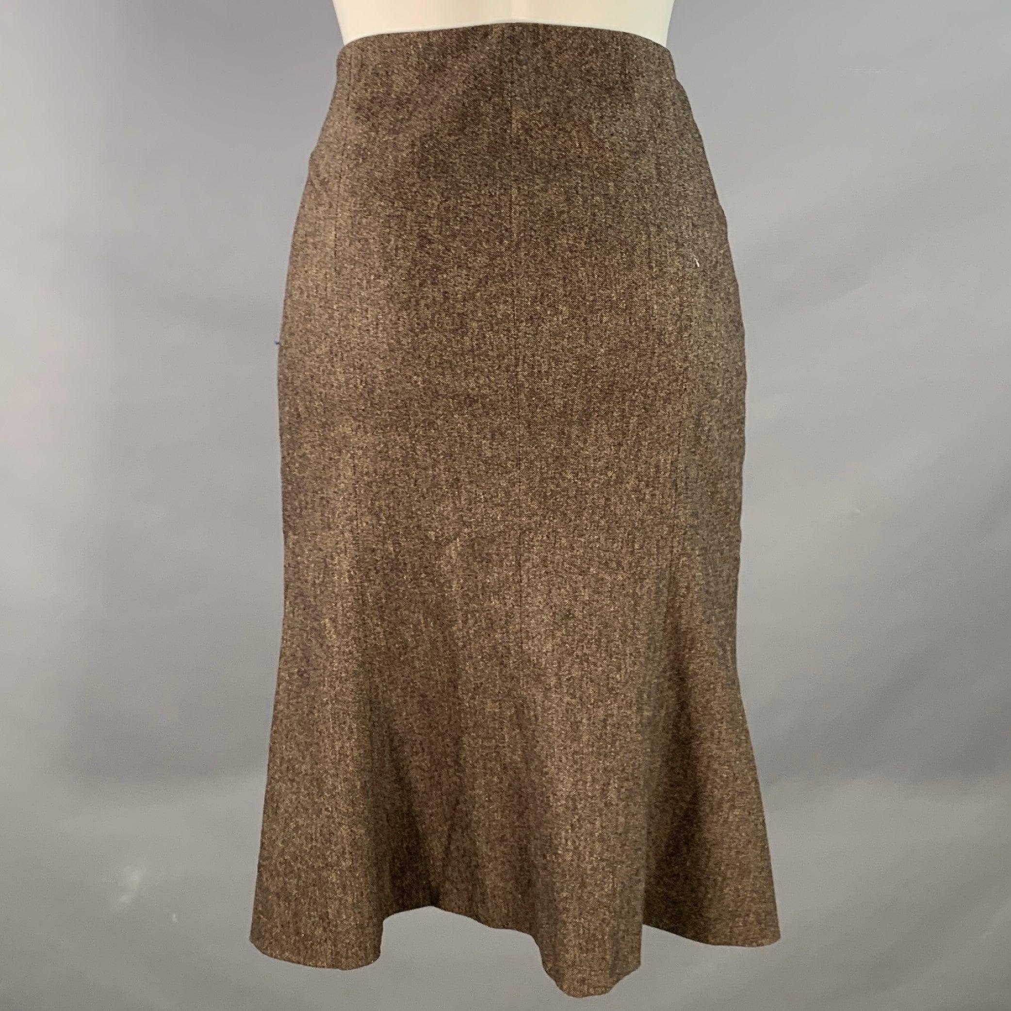 Jupe midi ALBERTA FERRETTI
en acétate marron et beige, avec un style tulipe et une fermeture à glissière sur le côté. Fabriqué en Italie. Excellent état.  

Marqué :   FR 38 

Mesures : 
  Taille : 31 pouces Hanche : 35 pouces Longueur : 25 pouces 

