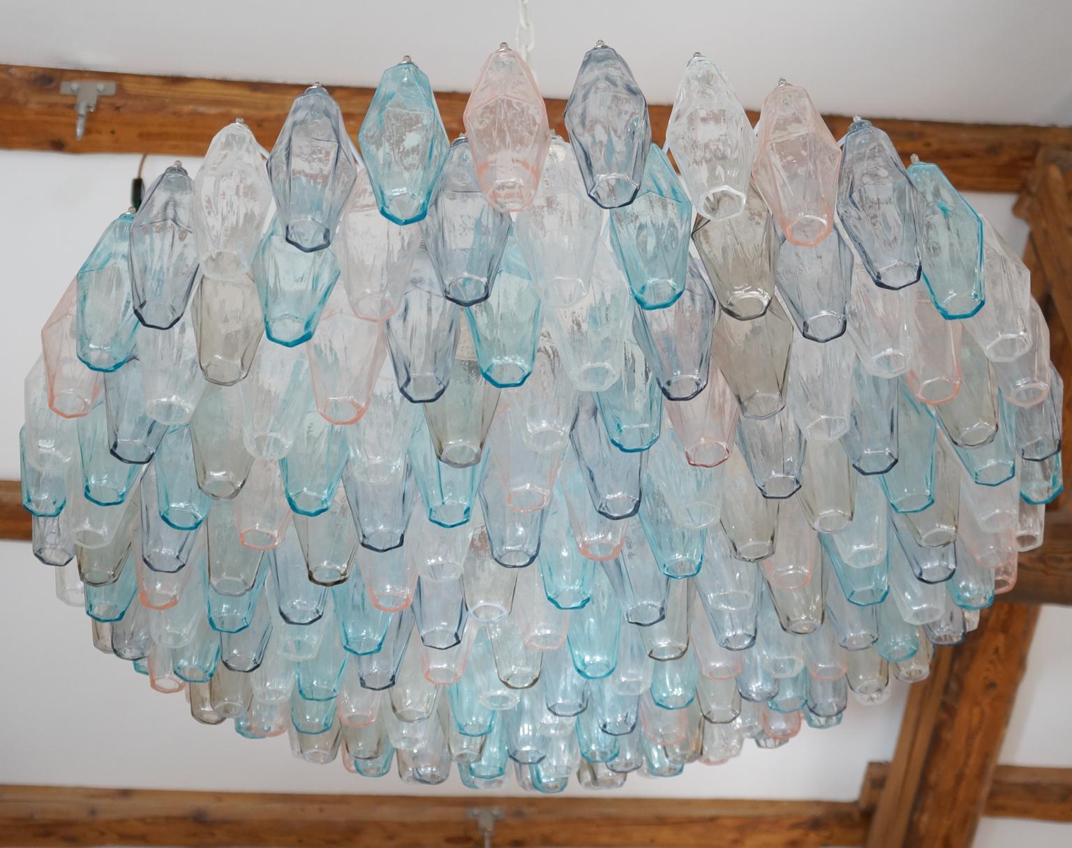 Murano blown glass Poliedri chandelier color grey, transparent, rose and light blue elements. 
This fantastic chandelier contains a total of 183 elements called Poliedri. 

This Classic developed in the 1960s and then reproduced by Maestro