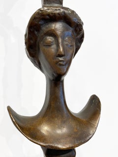 Lampadaire à tête de femme