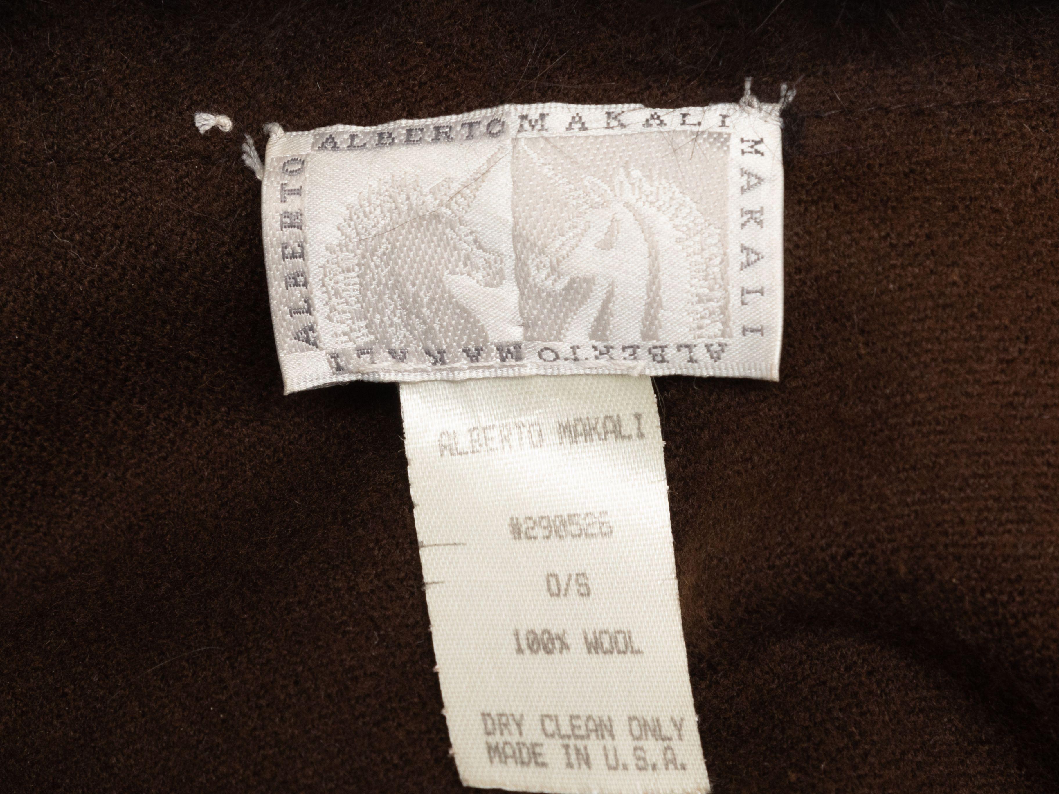 Product Details: Vintage brown wool fur-trimmed cape by Alberto Makali. Long sleeves. 60