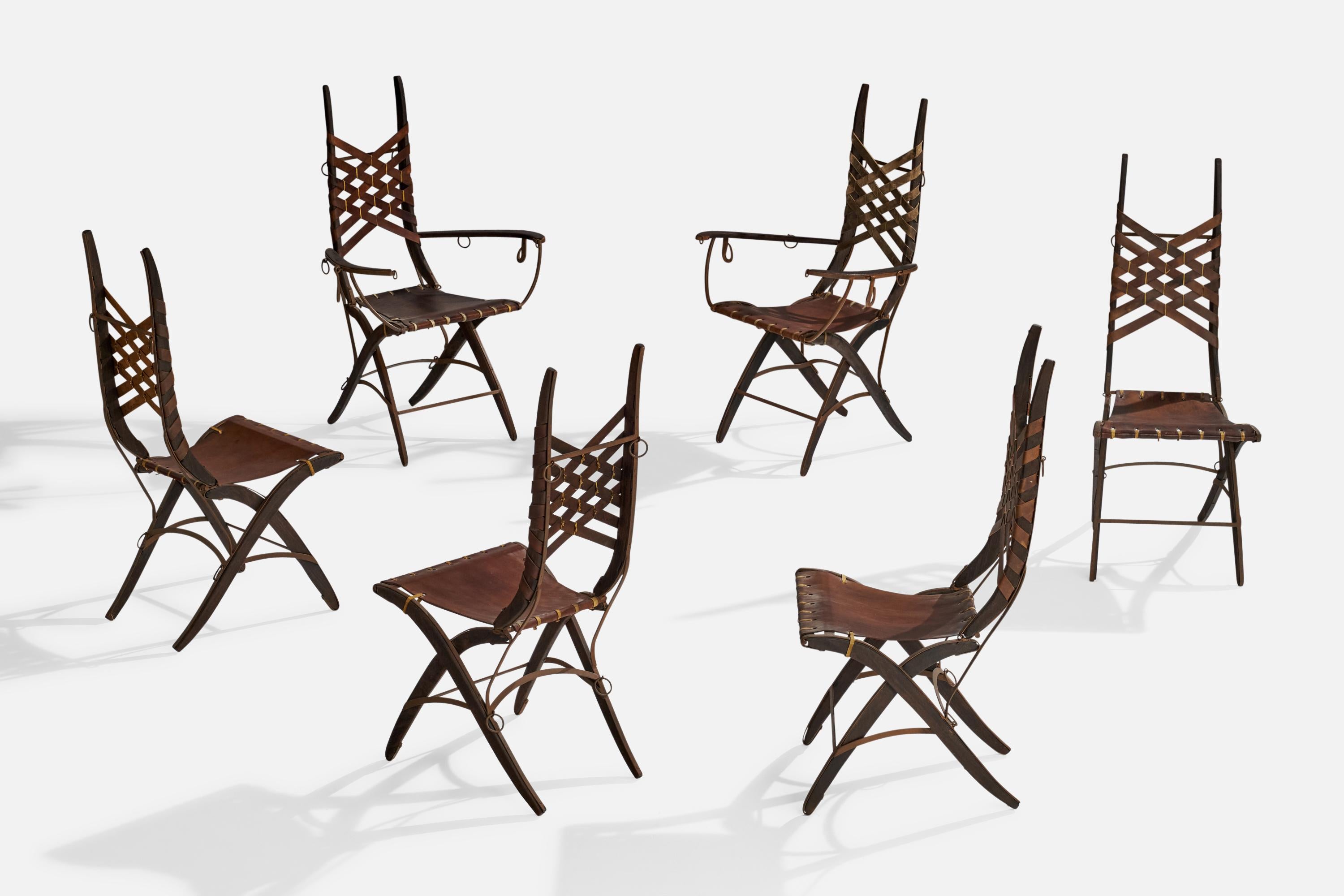 A set of 6 iron oak and brown leather dining chairs designed and produced by Alberto Marconetti, Italy, 1960s.

Seat height 18”.