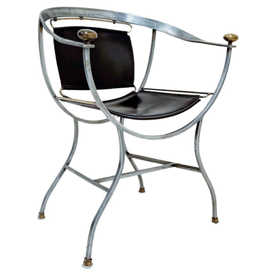 Poltrona Alberto Orlandi Pompei in acciaio, bronzo e pelle nera