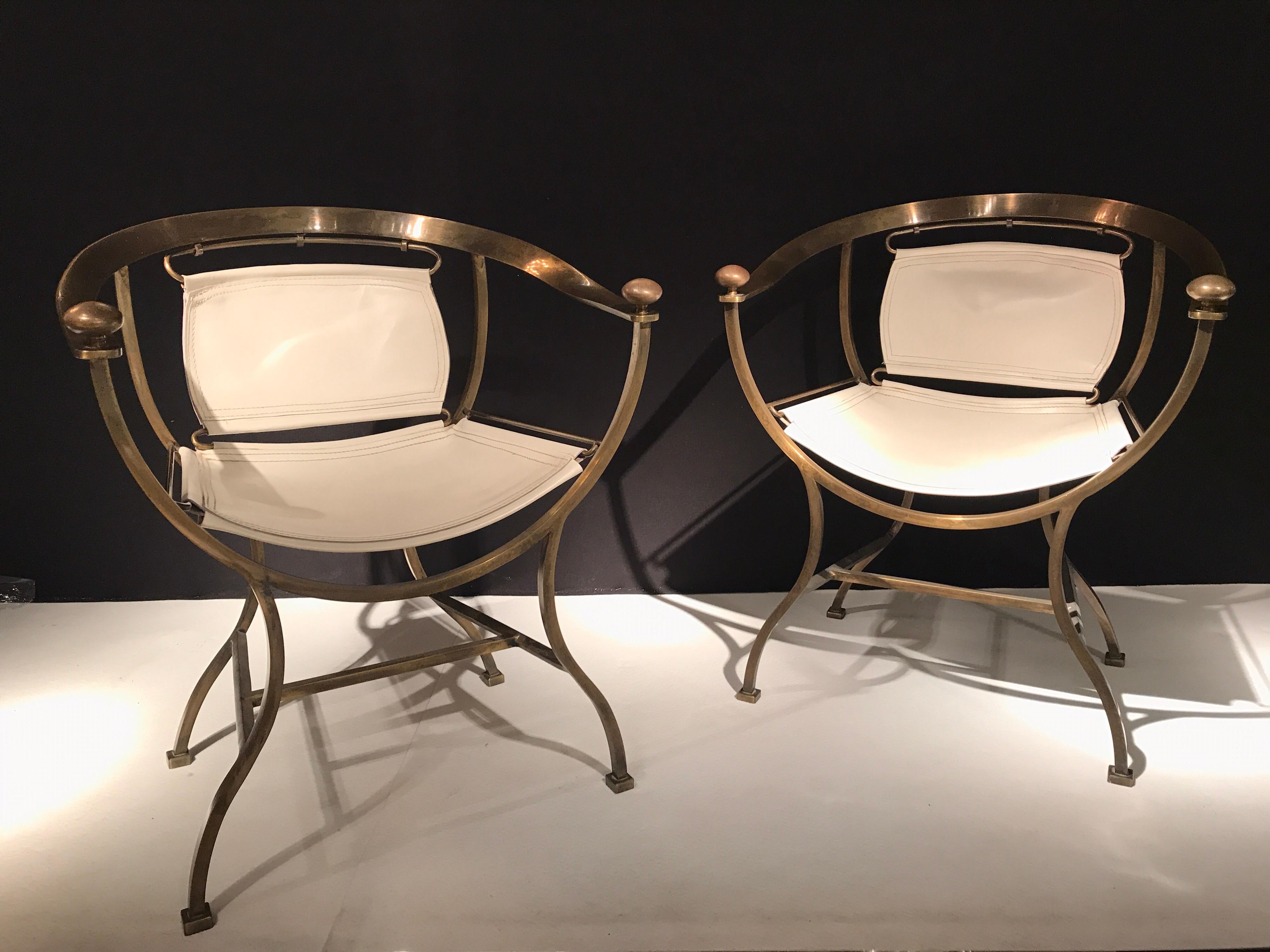 Massif brass and white leather armchairs by Alberto Orlandi, circa 1970-1980
Pompei model.