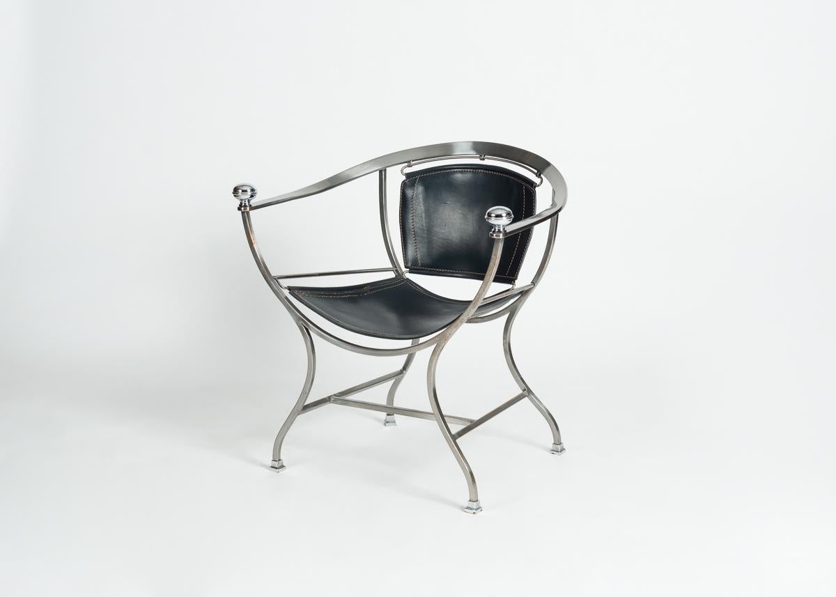 Polished steel and leather modernist armchair by Italian designer Alberto Orlandi, 1980s.