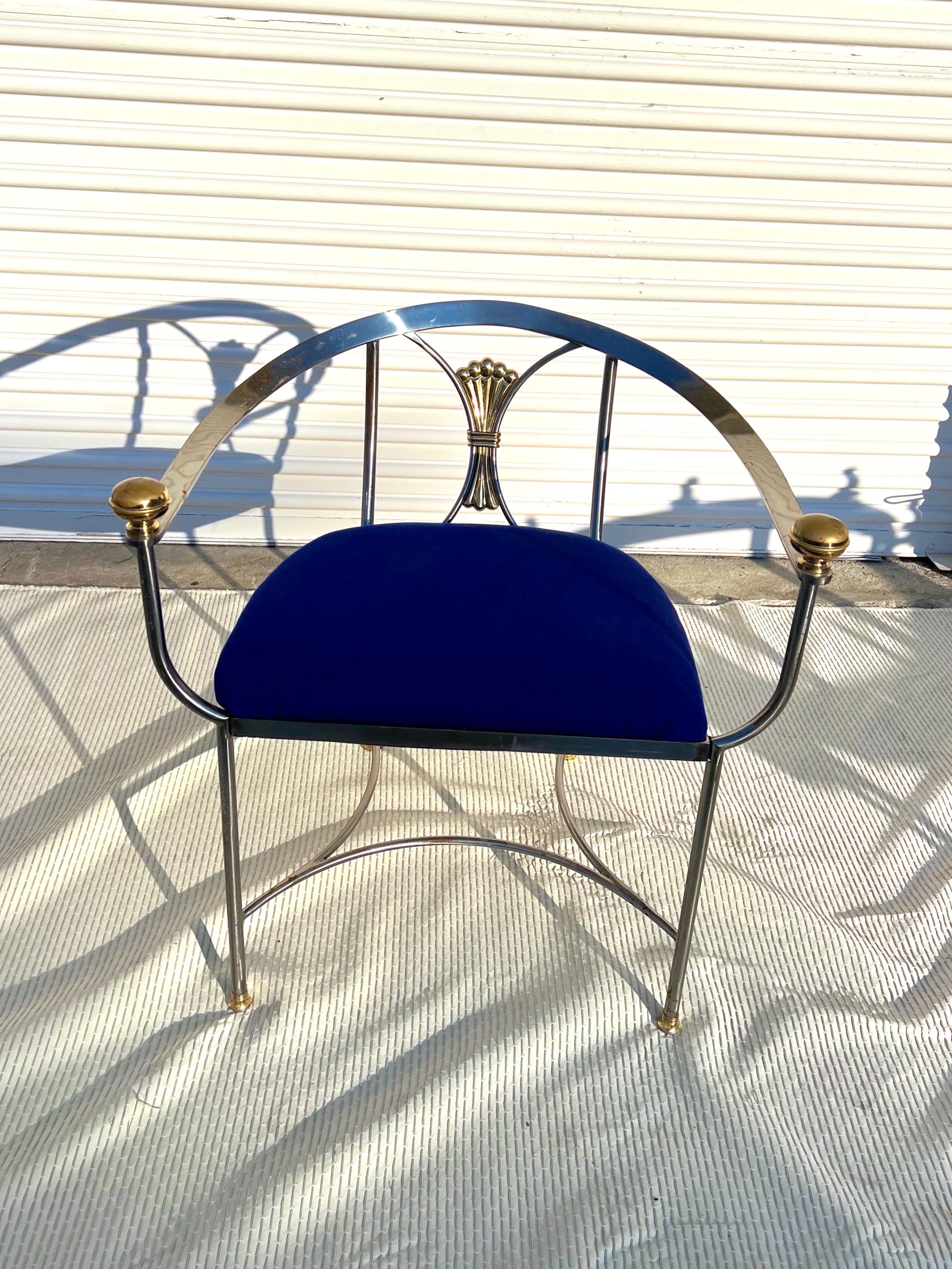 Alberto Orlandi occasional chair. , Italian Renaissance-revival Savonarola chair with sculptural polished metal and solid brass decorative details. New webbing and foam has been added.  Blue canvas fabric is just a placeholder so that you can