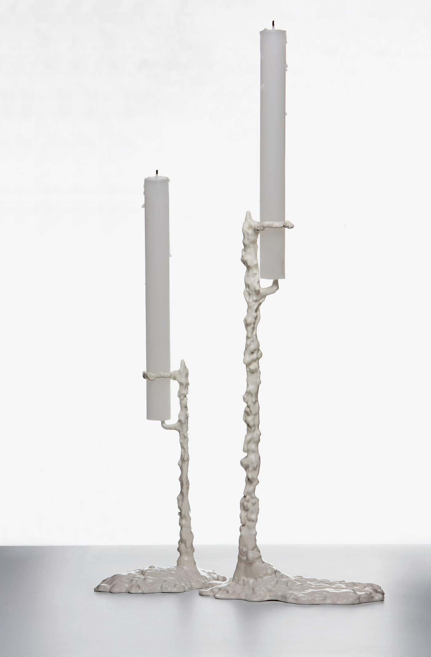 Alberto Pair of Candleholders designed by Oscar Tusquets.
Manufactured by Bd Barcelona (Spain).

Candleholder in cast brass finish.

Dimensions: 
High: D 8 x W 12 x H 28 cm. 
Low: D 6 x W 10 x H 20 cm.

Alberto designed by Oscar Tusquets for BD