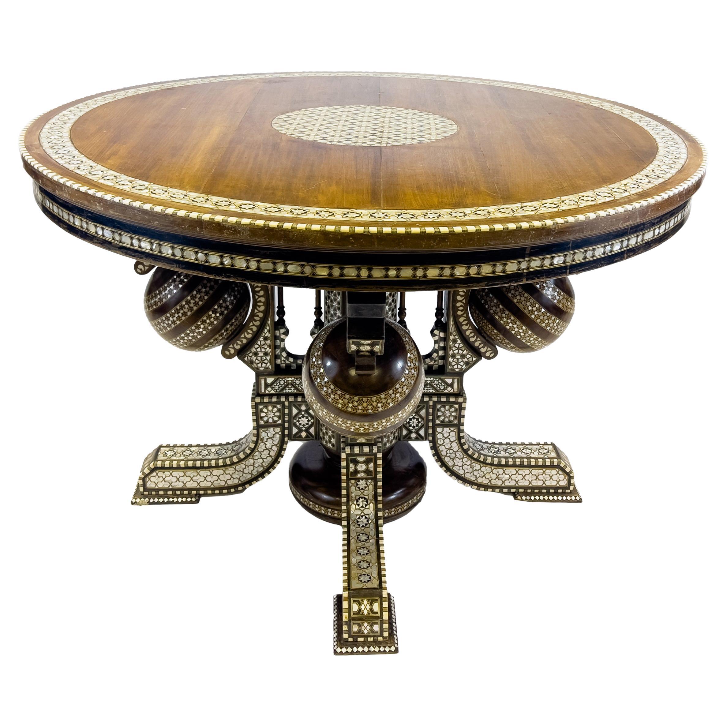 Table centrale/table de salle à manger ronde incrustée de nacre et d'os de style Alberto Pinto 