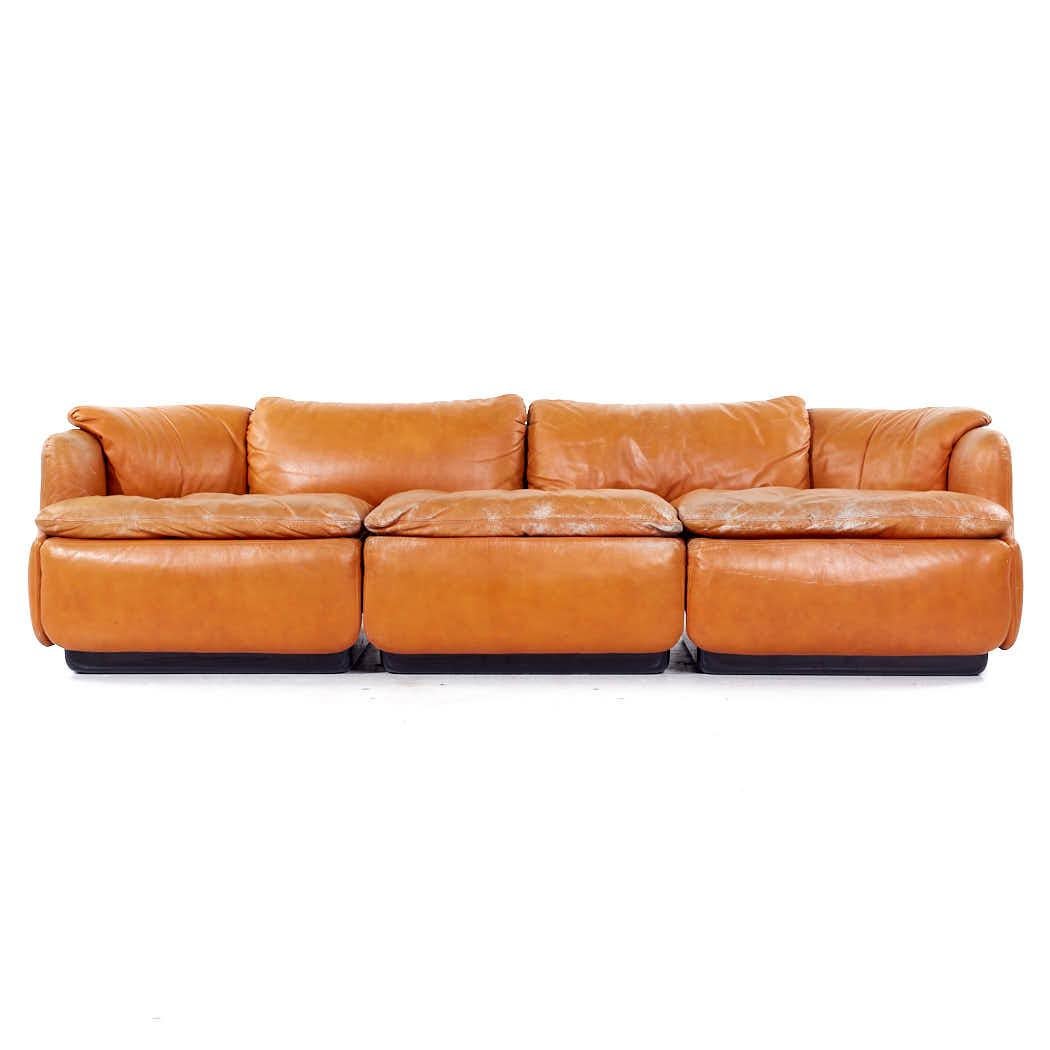 Alberto Roselli for Sapporiti Confidential Mid Century Italian Leather Sofa

This sofa measures: 93 wide x 33 deep x 25 inches high, with a seat height of 16.5 and arm height of 22 inches

All pieces of furniture can be had in what we call restored