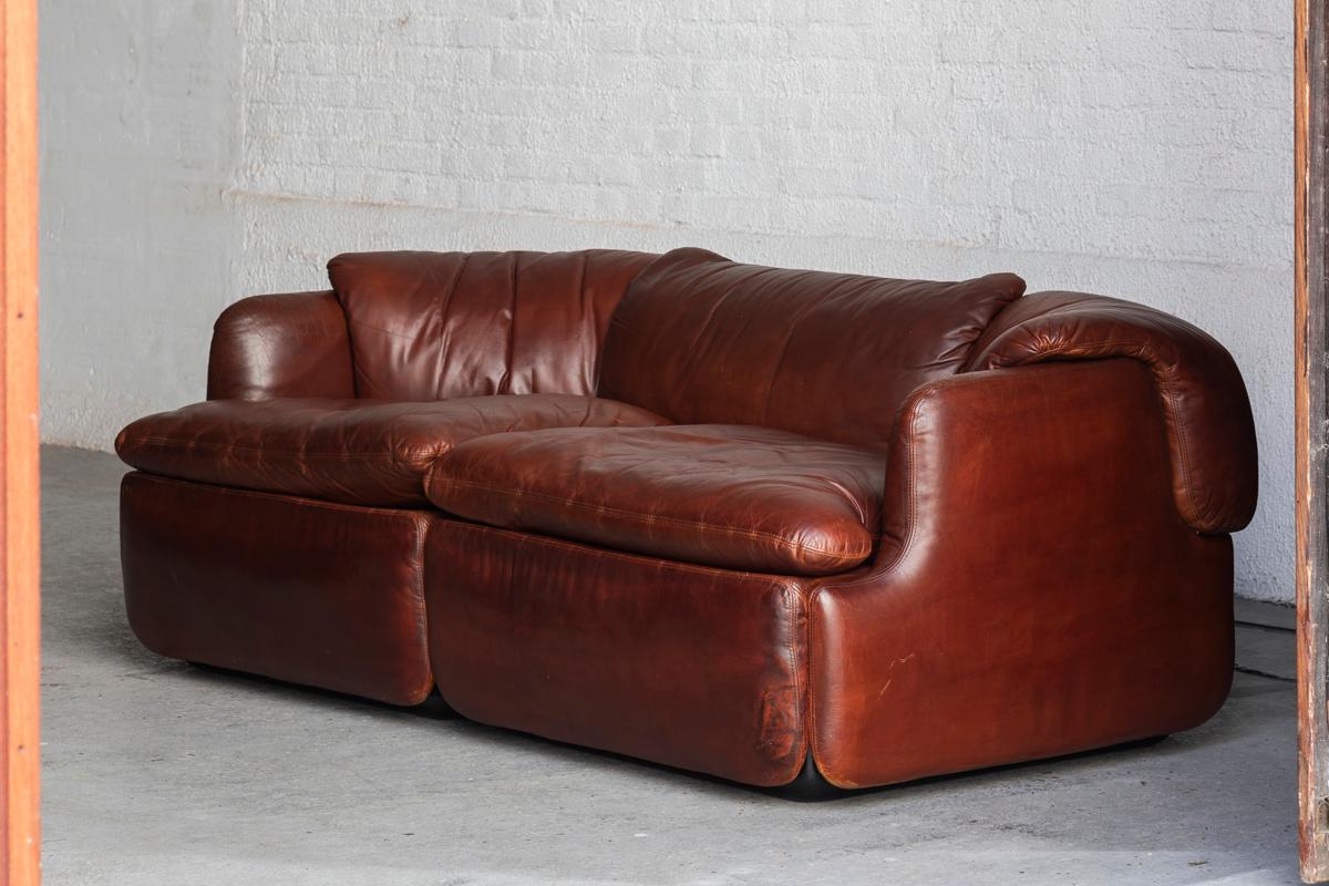 2-Seater sofa, model Confidential, designed by Alberto Rosselli and produced by Saporiti in Italy in the 1970’s. The confidential series was engineered to be entirely produced by polyurethane injected foam. The metal frame is executed in steel. The