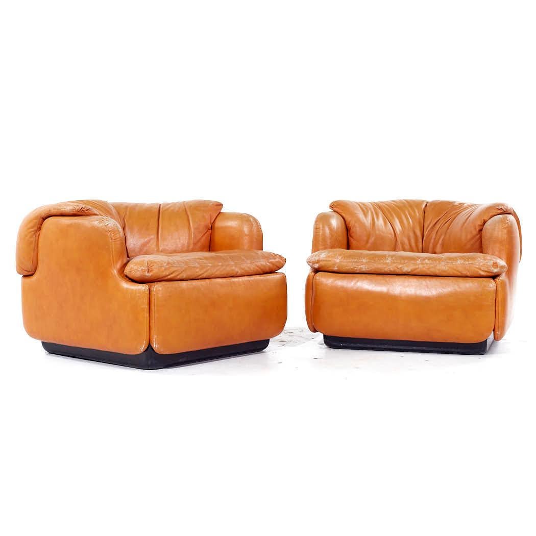 Alberto Rosselli for Saporiti Confidential Mid Century Leather Lounge Chairs - Pair

Each lounge chair measures: 35 wide x 33 deep x 25 high, with a seat height of 16.5 and arm height/chair clearance 22 inches

All pieces of furniture can be had in