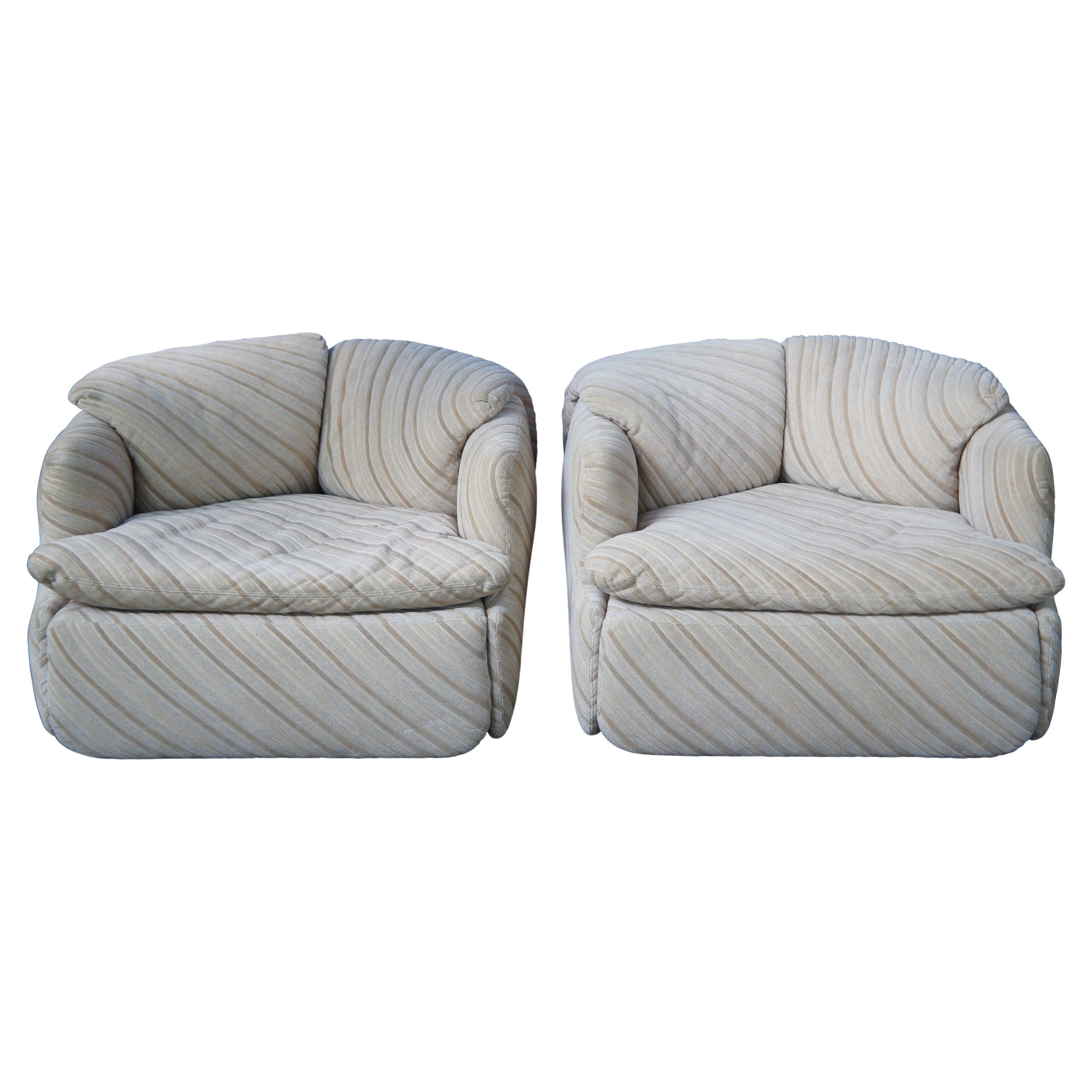 Iconic pair of Fratelli Saporiti Italia Confidental lounge, library or club arm chairs by Alberto Rosselli, circa 1970s. One of the first modular club chairs with a puzzle like cushion connection.

Provenance : Jerome Schottenstein Estate, Columbus