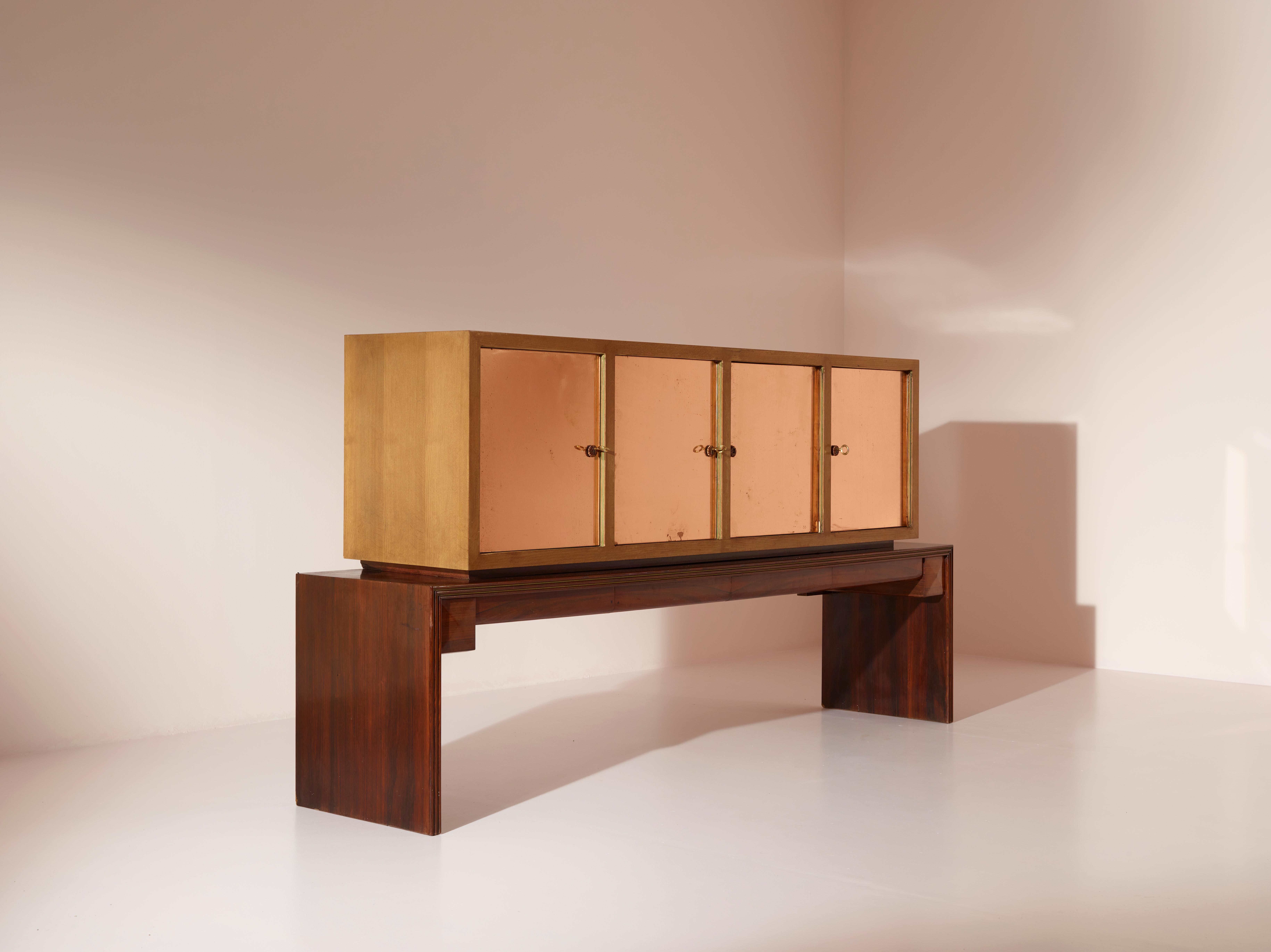 This sideboard cabinet, crafted in the 1960s by Alberto Salvati and Ambrogio Tresoldi, is a prime example of how neoclassical design principles were incorporated into midcentury Furniture. Produced in Lissone (Milan) for a private commission, this