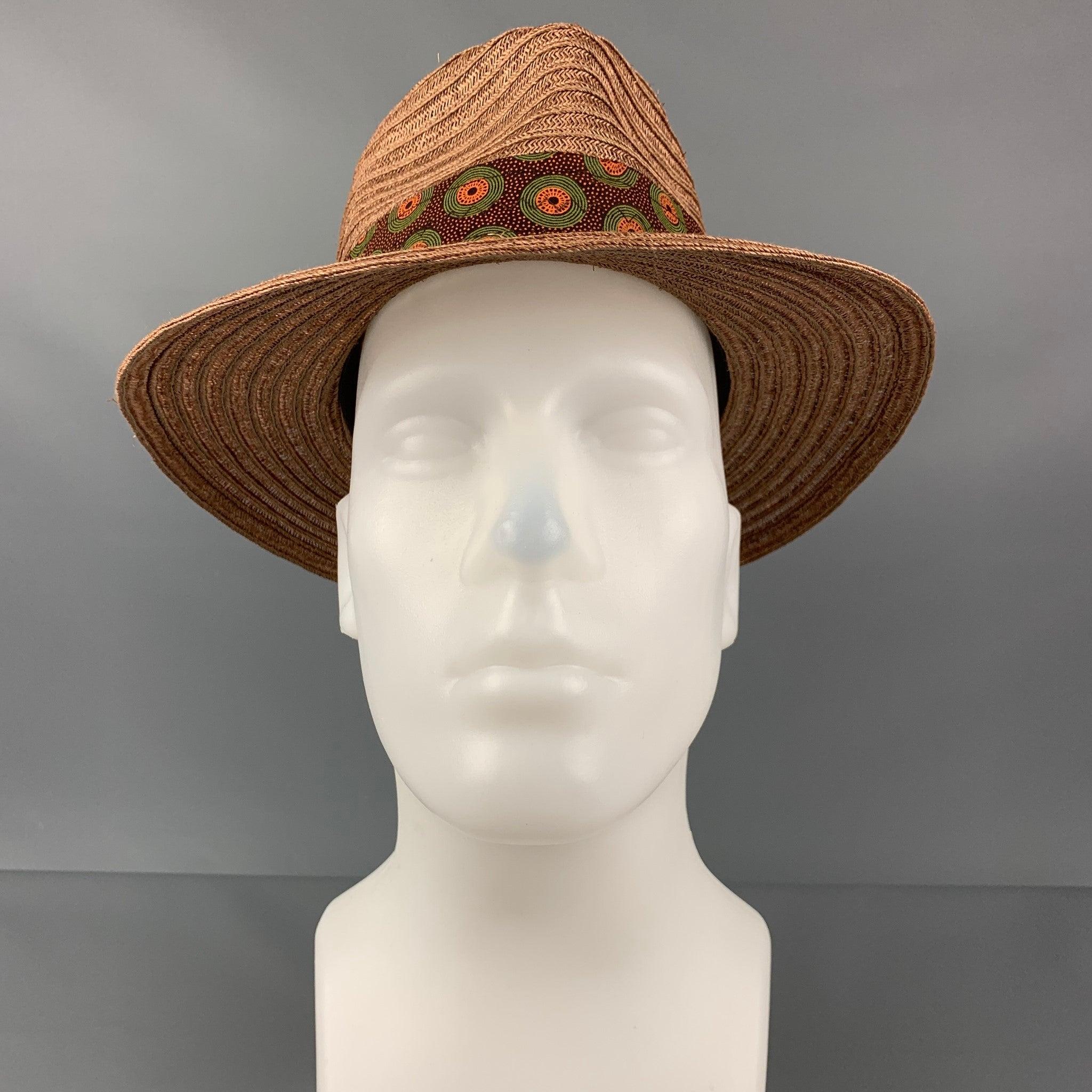 ALBERTUS SWANEPOEL hat comes in a brown woven material featuring a fedora style and abstract print strap detail. Made in USA.
 Very Good
 Pre-Owned Condition. 
 

 Marked:  M 
 

 Measurements: 
  Opening: 21 inches Brim: 3 inches Height: 4 inches 
