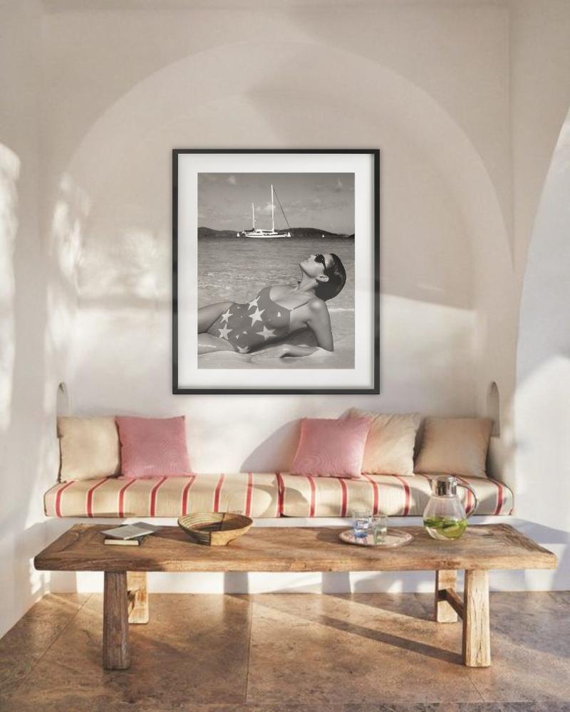 Black and White Portrait of Cindy Crawford in a Star Bathingsuit lounging at the beach, photographed by Albert Watson in 1986.

All prints are limited edition. Available in two sizes. High-end framing on request.

All prints are done and signed by