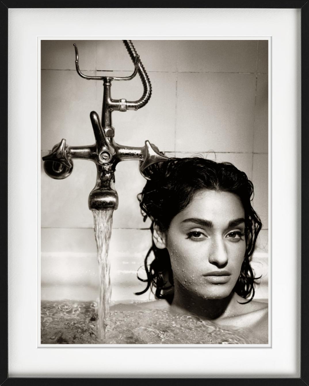 Black and white portrait of Supermodel Yvette Lozano sitting in a Bathtub, photographed by Albert Watson in 1990.

All prints are limited edition. Available in multiple sizes. High-end framing on request.

All prints are done and signed by the