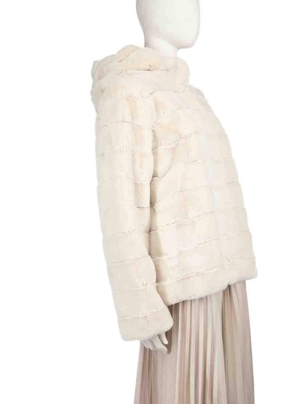 CONDITION is Very good. Minimal wear to coat is evident. There is a small pluck to the weave of the lining on this used Albinea designer resale item.
  
  Details
  Ecru
  Faux Fur
  Coat
  Hooded
  Zip and snap button fastening
  2x Side pockets
 