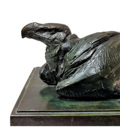Bronze Lying bird of prey +by Albéric Collin (1886-1962)