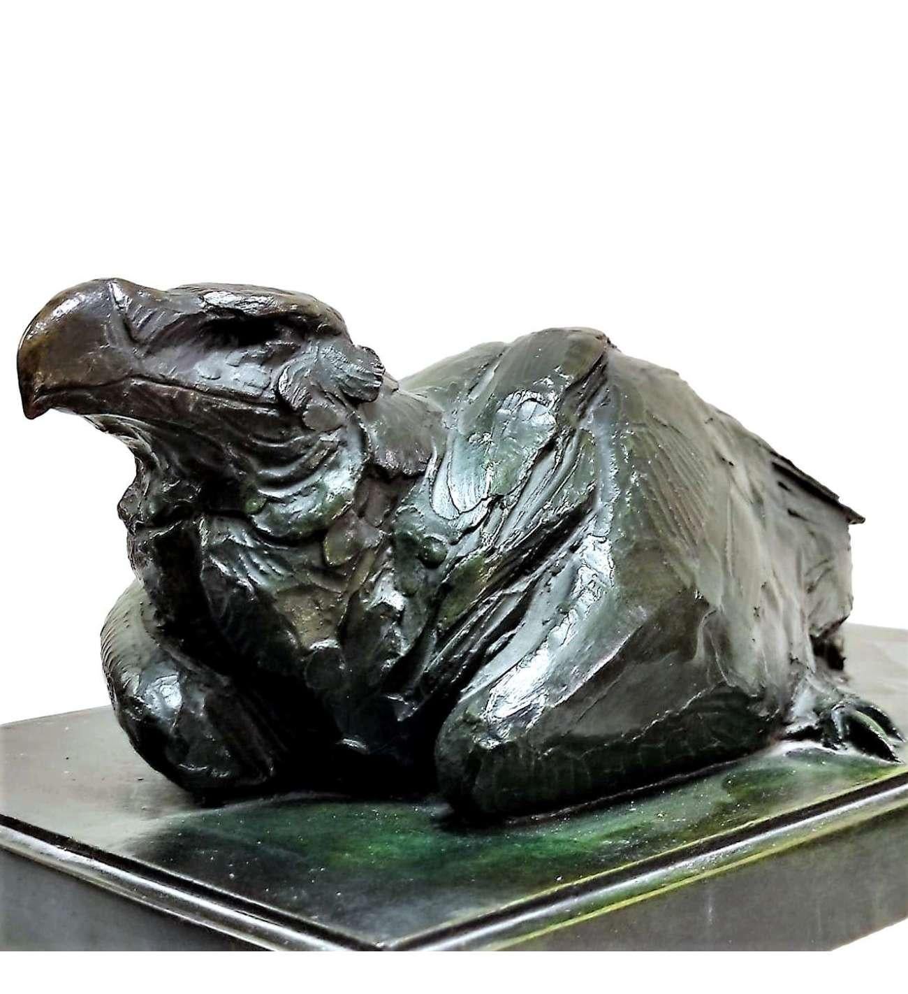 Lying bird of prey

A fine quality, twentieth-century bronze model of a resting eagle by Alberic Collin (Belgian 1886-1962). Cast by the Rocher Paris foundry signed, inscribed (Rocher Paris Cire perdue) and numbered (1/8). This cast has a green
