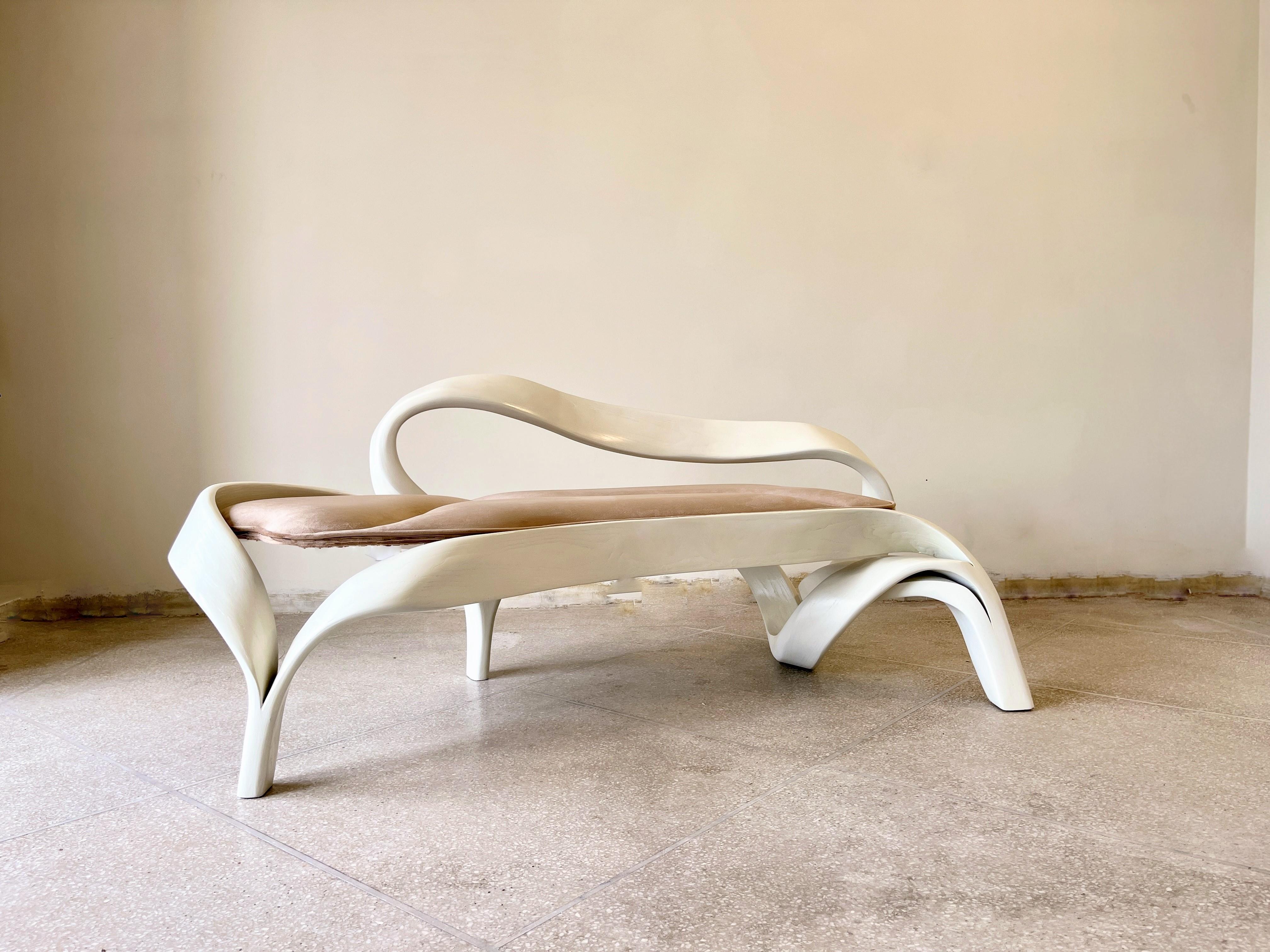 The Two Seater No. 3, a chassis designed by Raka Studio using an ancient Japanese technique of bending wood. The design is inspired by the organic flows of nature and the natural shapes that occur in a natural landscape. Each design element