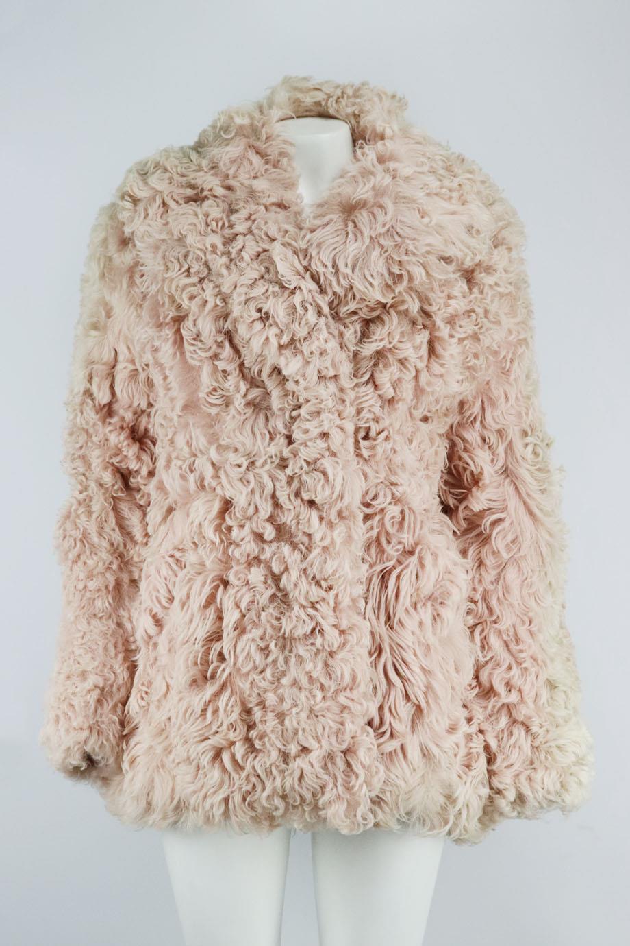 A.L.C. oversized shearling coat. Pink. Hook and eye fastening at front. 100% Shearling; lining: 63% cupro, 37% cotton. Size: XSmall (UK 6, US 2, FR 34, IT 38). Shoulder to shoulder: 18.5 in. Bust: 42 in. Waist: 44.4 in. Hips: 48 in. Length: 31 in