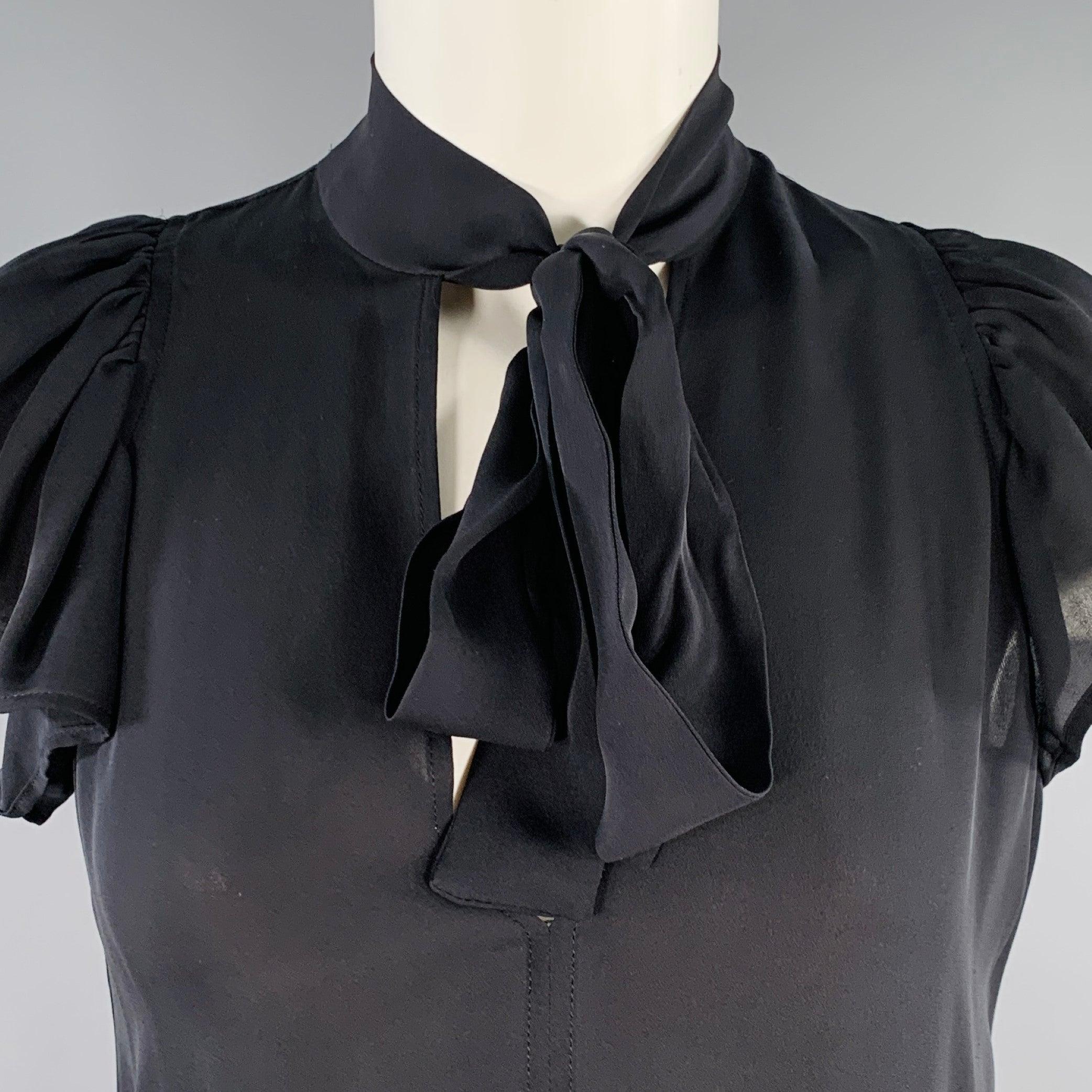 A.L.C. dress top
in a black silk chiffon featuring cap sleeves, and V-neck with pussybow tie closure.Excellent Pre-Owned Condition. 

Marked:   2 

Measurements: 
 
Shoulder: 12.25 inches Bust: 36 inches Sleeve: 5 inches Length: 29 inches 
  
  
