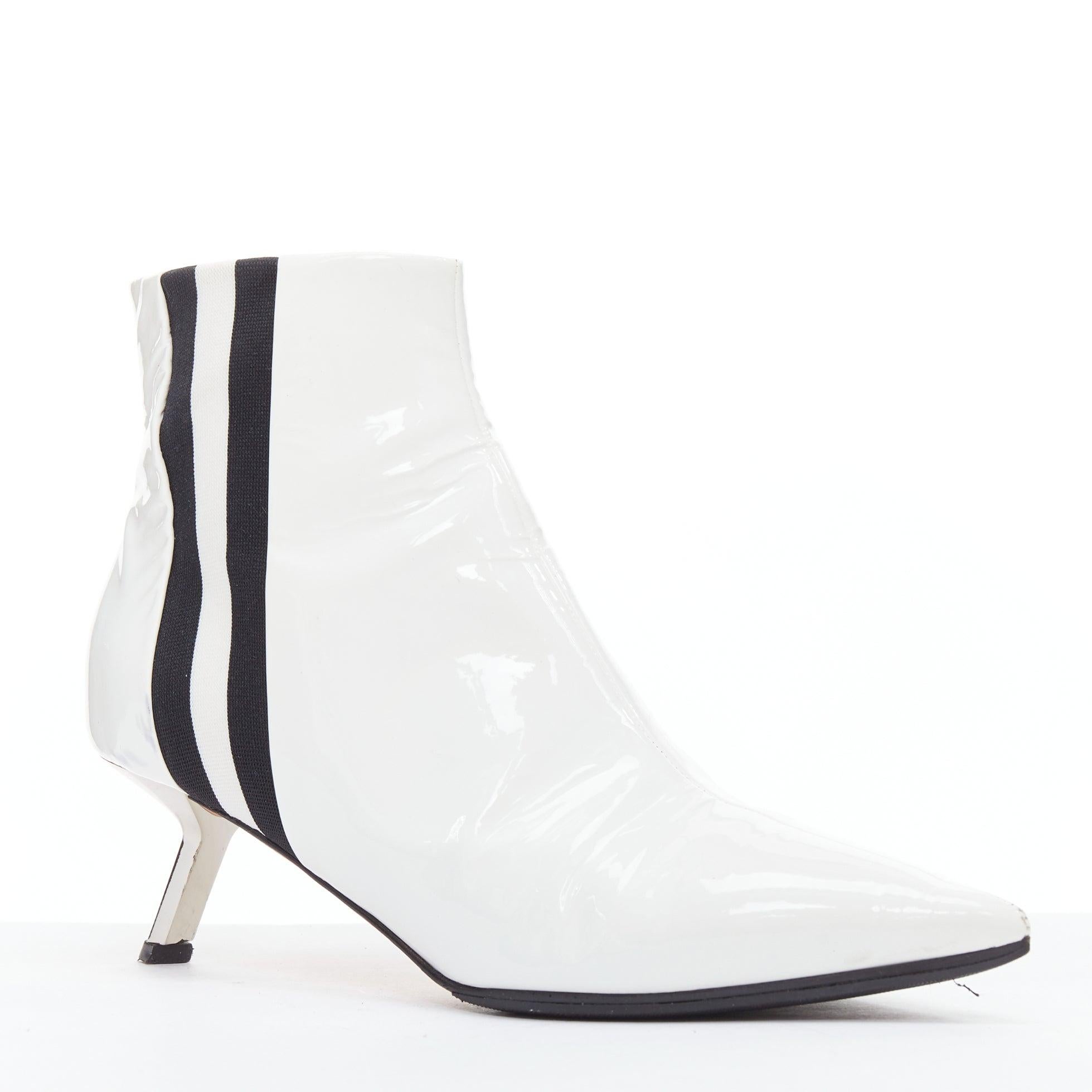 ALCHIMIA DI BALLIN bottines à bandes latérales en cuir verni blanc argenté EU38.5
Référence : NKLL/A00423
Marque : Alchimia Di Ballin
Modèle : Rayures latérales
MATERIAL : Cuir verni, métal
Couleur : Blanc, Noir
Motif : Solide
Fermeture :