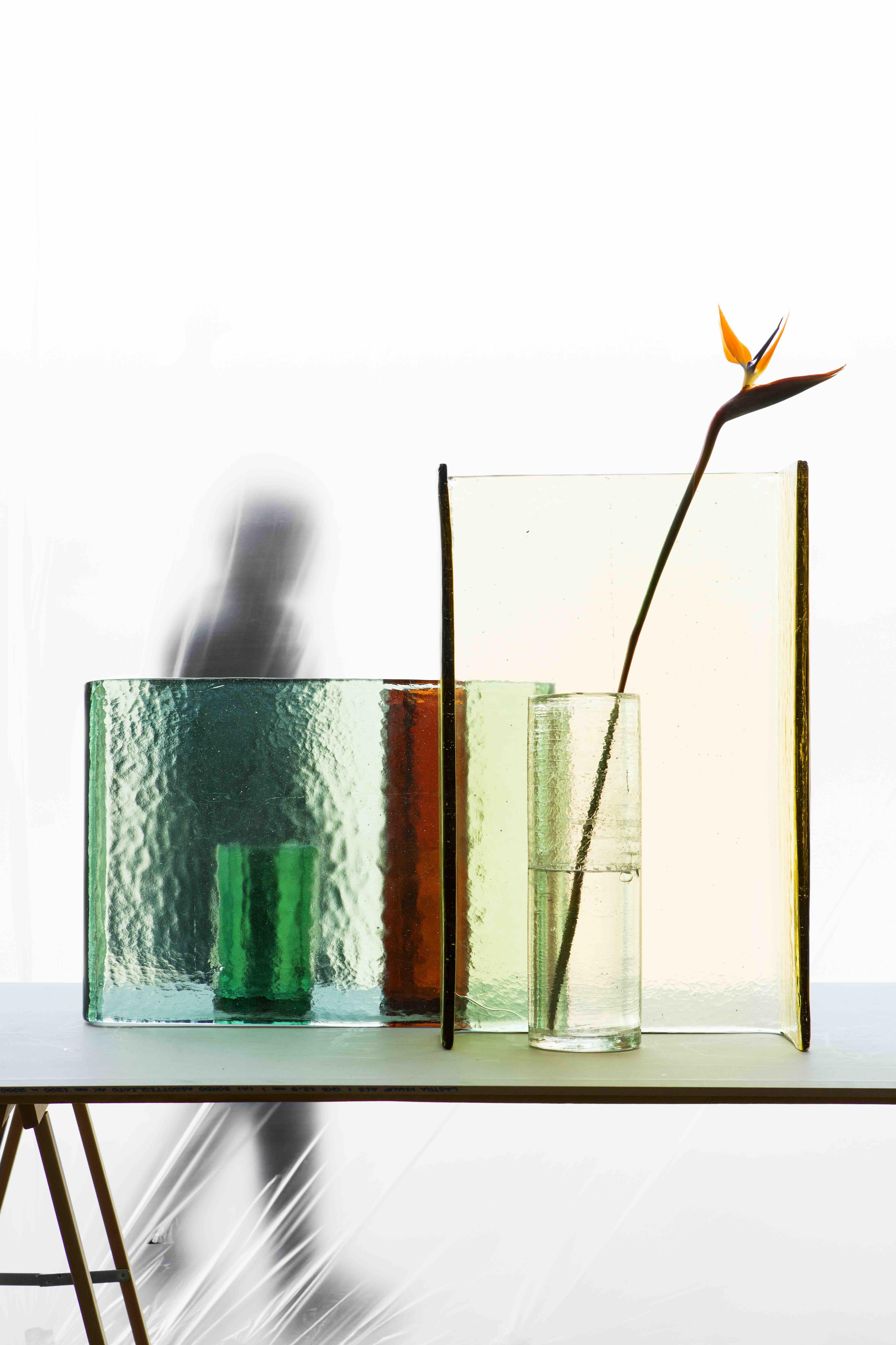 Alcova set 01
1 x Dritto Short Amber
1 x Vaso L Amber
1 x Cilindro S Crystal

Alcova is a collection of handcrafted, geometric objects that when grouped create intimate landscapes. Ronan and Erwan Bouroullec describe the collection as follows: