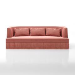 Alcove Linear Sofa – Curved Backseat with Fringe Base In Rose Velvet
