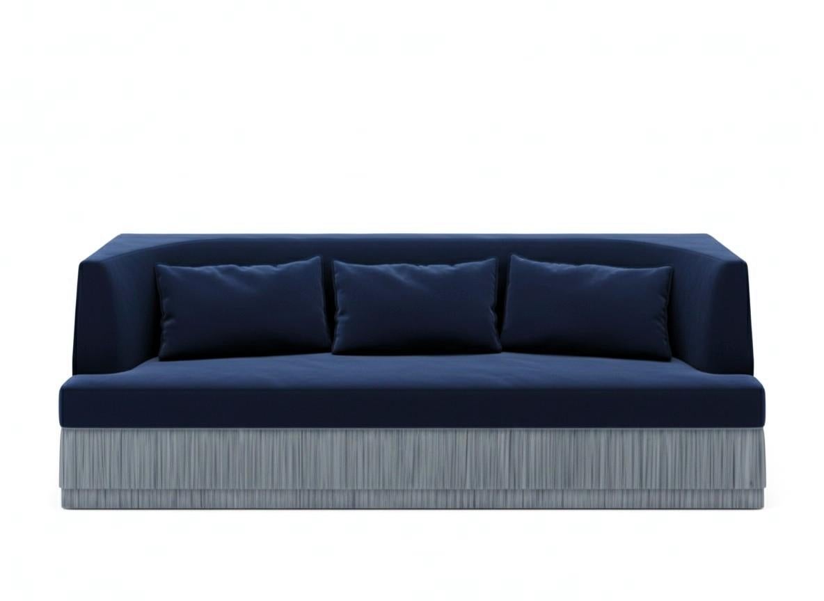 A sculptural statement piece defined by its architectural silhouette and introspective form. The Alcove Sofa embraces a bold exterior — rectangular and linear — that gently reveals a soft, concave inner curve. The design evokes the feeling of a