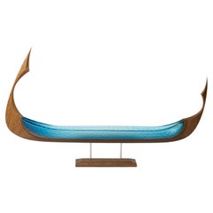 Aldebaren, an aqua glass & oak ship sculpture by Backhaus & Brown and Egeværk