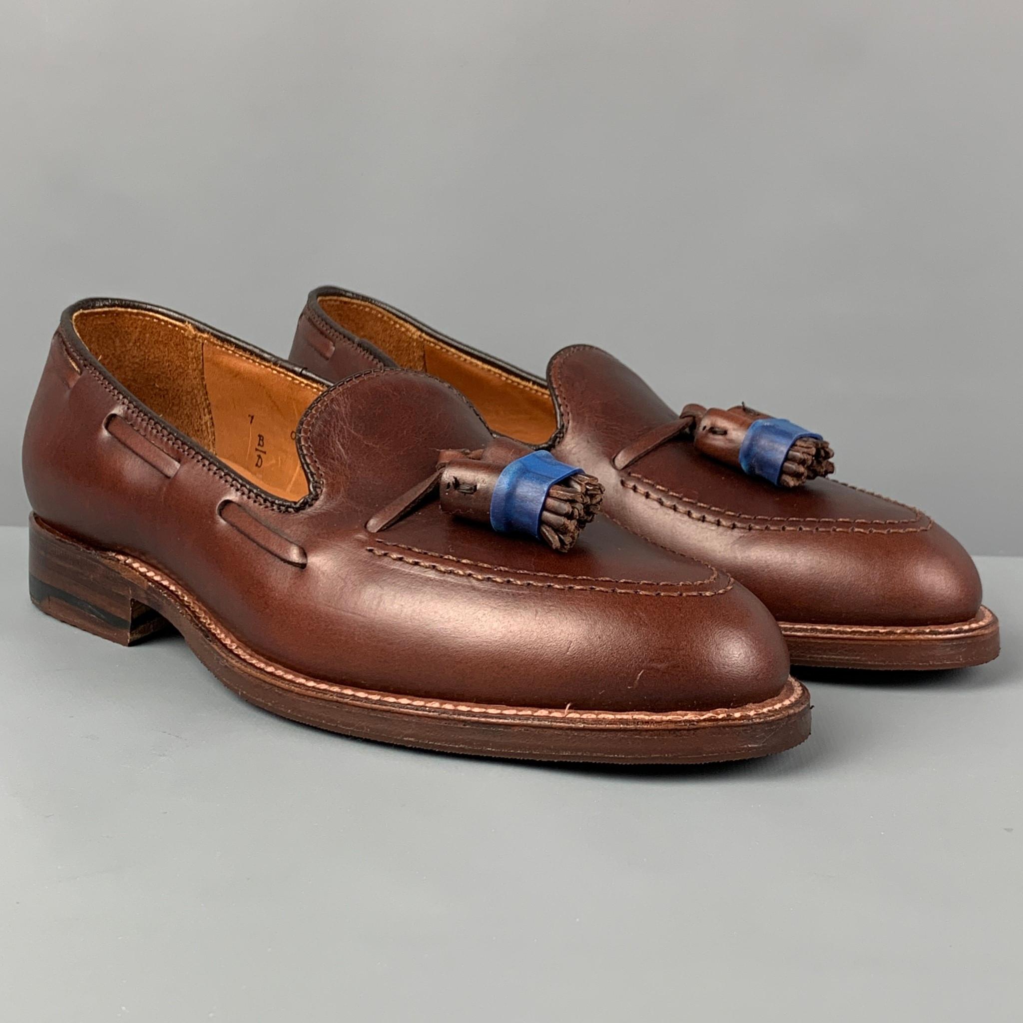 ALDEN 'Bootmaker Edition' loafers comes in a brown distressed leather featuring a front tassel design, top stitching, and a slip on style. Made in USA. 

New With Box. 
Marked: 7 B/D 0B03 027 36602

Outsole: 11 in. x 4 in.
