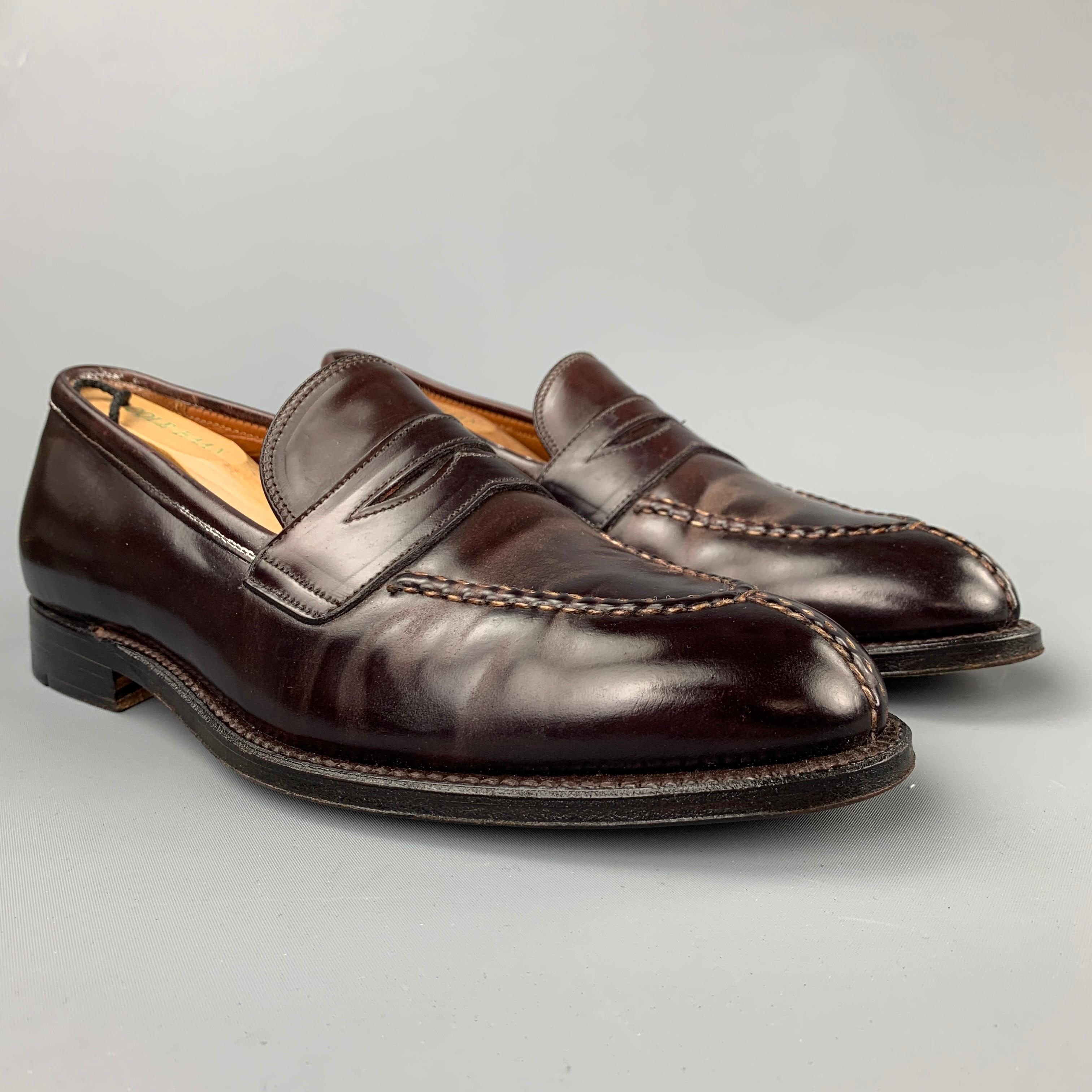 ALDEN loafers comes in a color 8 cordovan leather featuring a penny strap, top stitching, slip on, and a wooden sole. Made in USA.

Very Good Pre-Owned Condition.
Marked: 10 B/D

Outsole: 12 in. x 4 in.