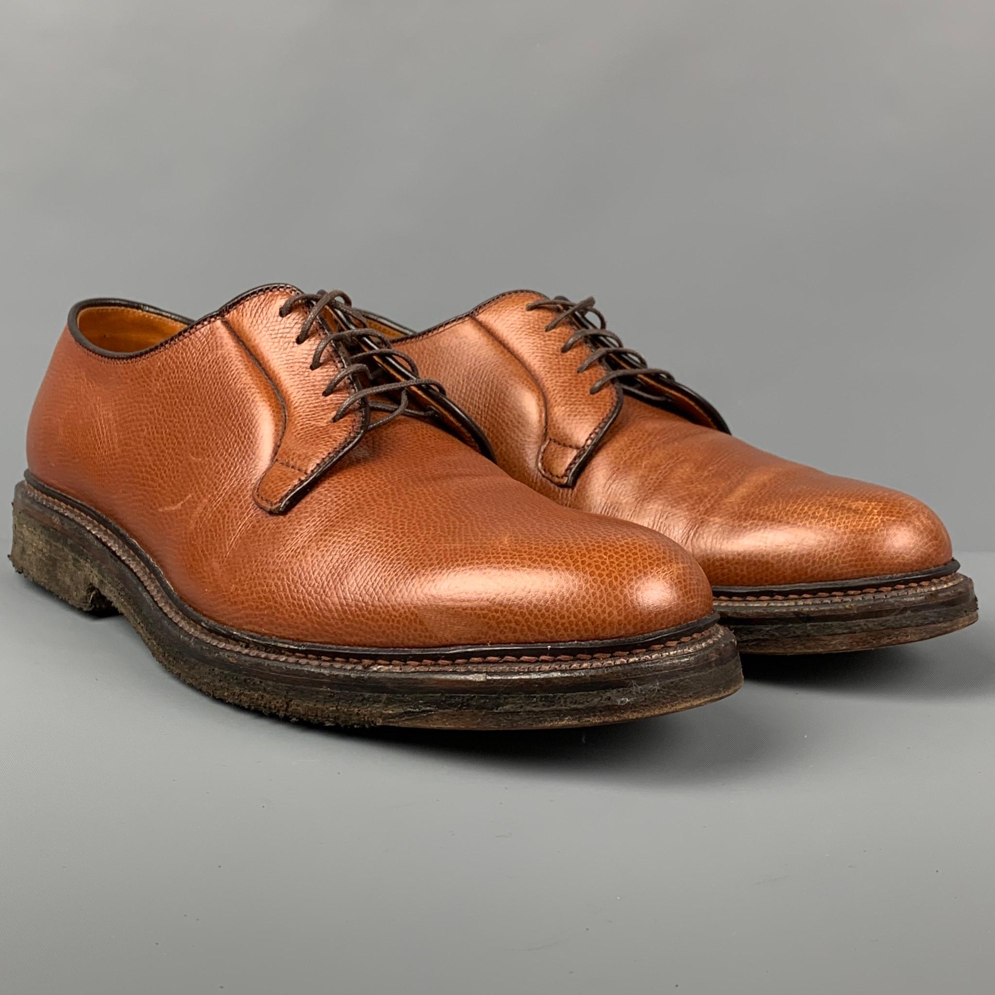 ALDEN shoes comes in a tan pebble grain leather featuring a crepe sole and a lace up closure. Includes shoe tress. 

Very Good Pre-Owned Condition.
Marked: 10.5 B/D

Outsole: 13 in. x 4.5 in. 